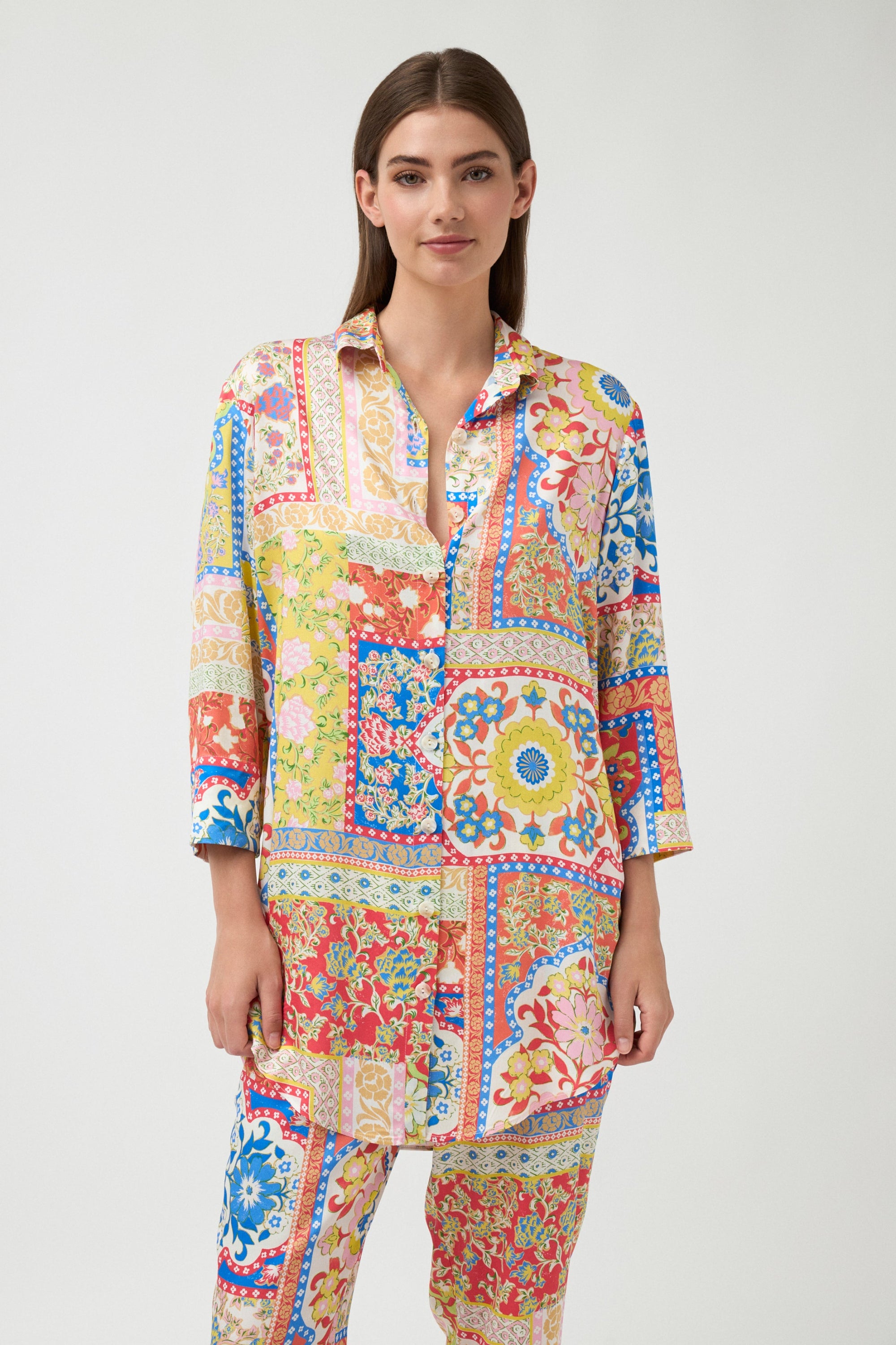 multi colour tile print shirt worn by model