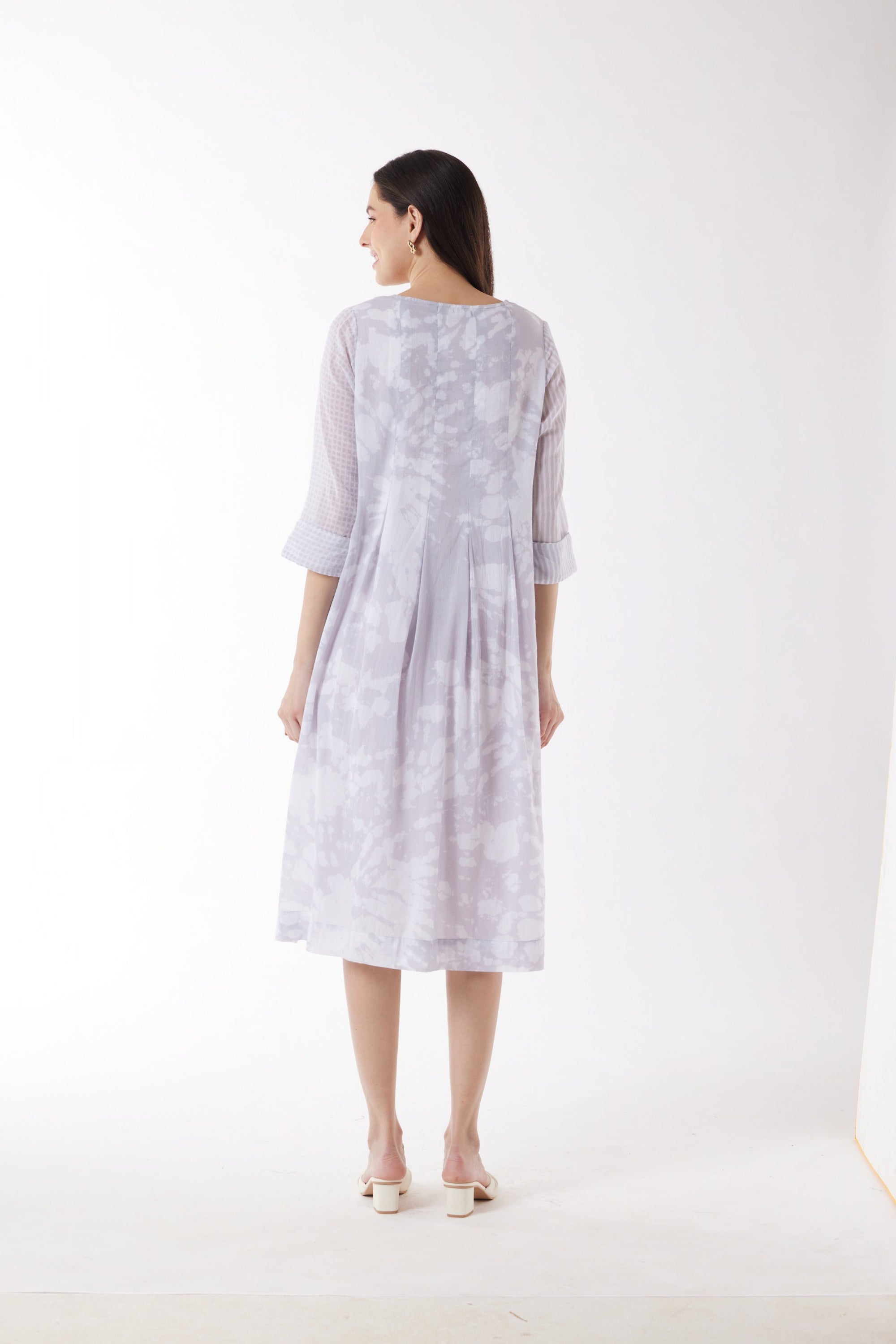 light grey print midi dress worn by model back view