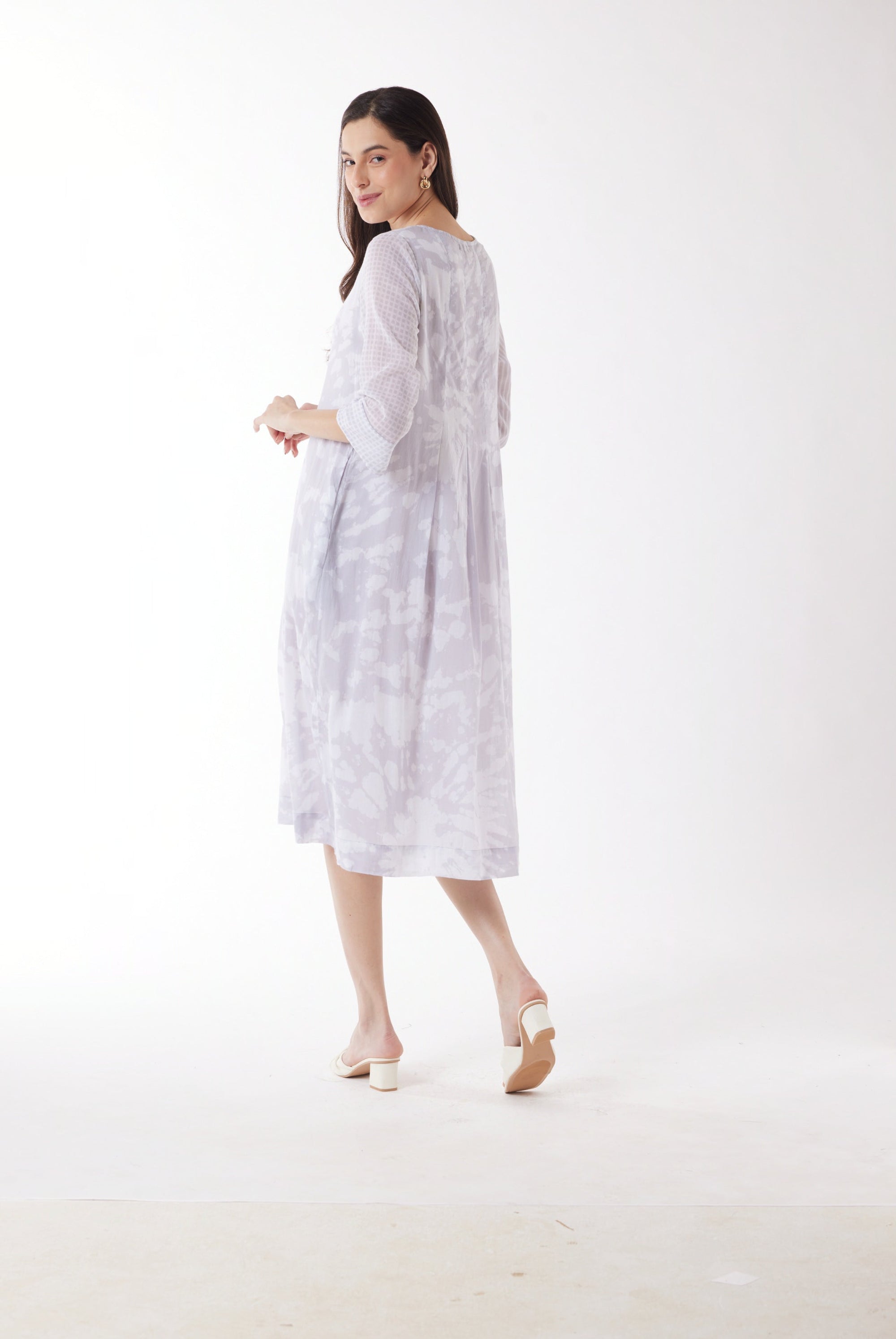 light grey print midi dress worn by model back view