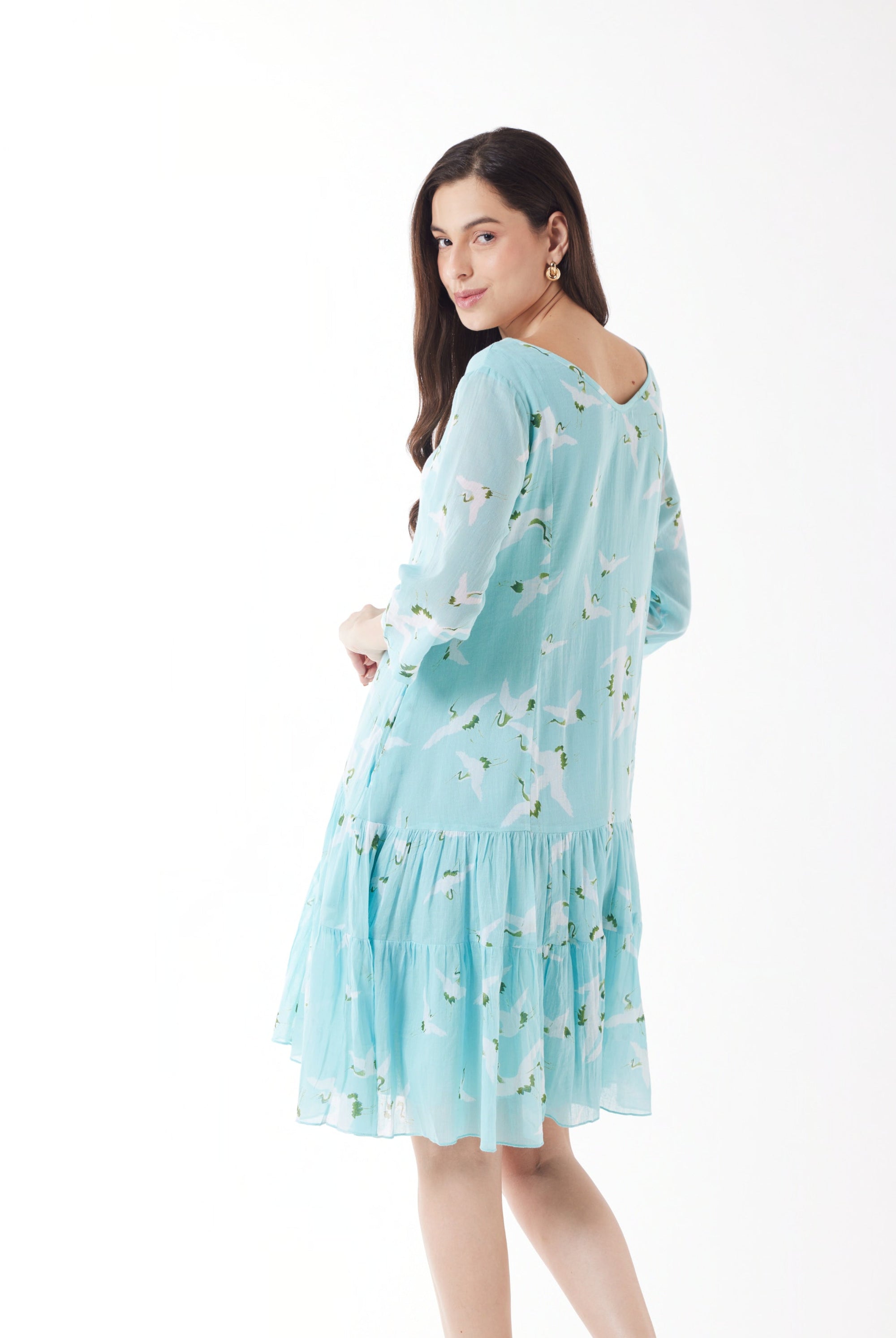 blue with white bird print midi dress worn by model back view