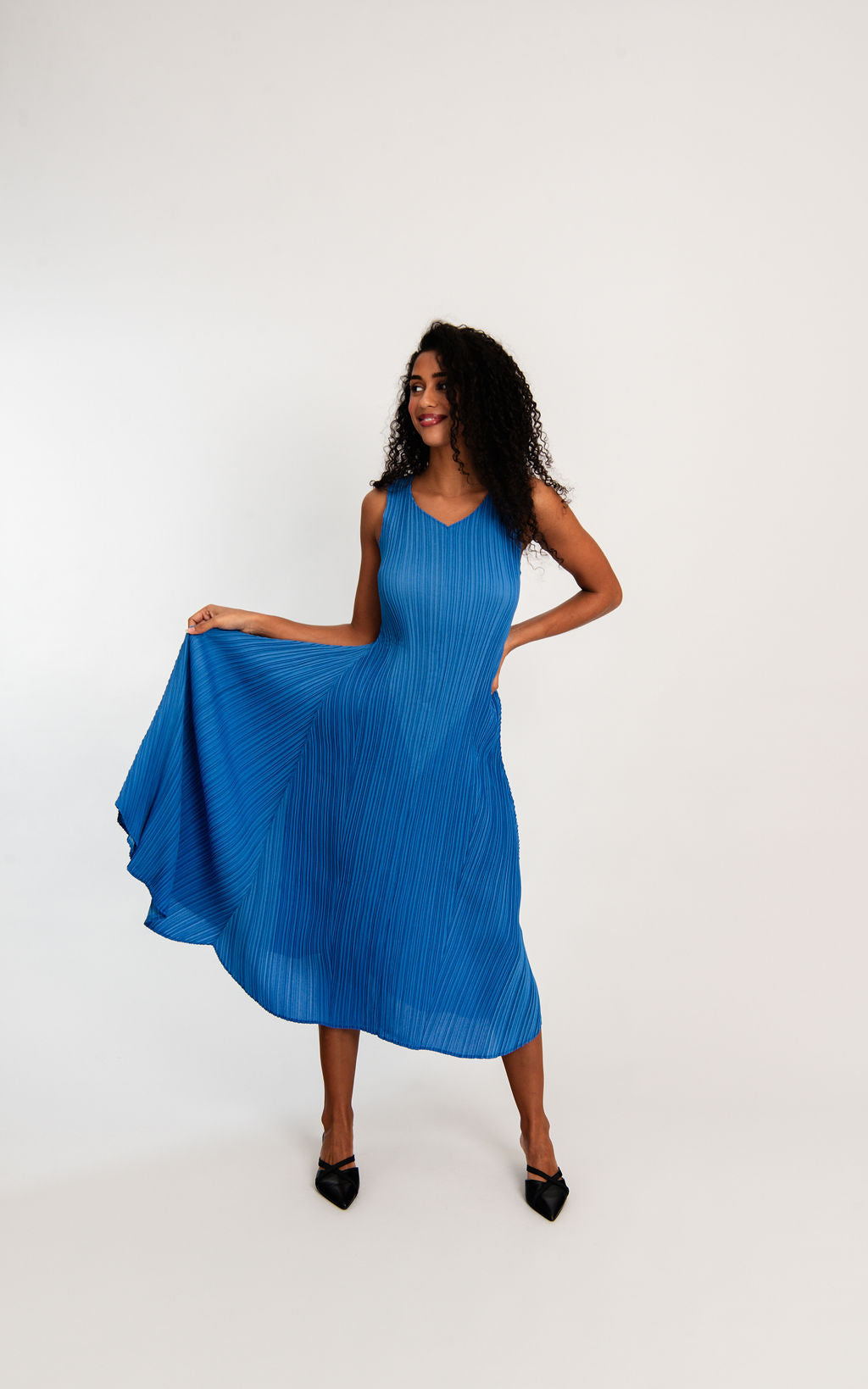 midi maxi pleated dress in royal blue worn by model