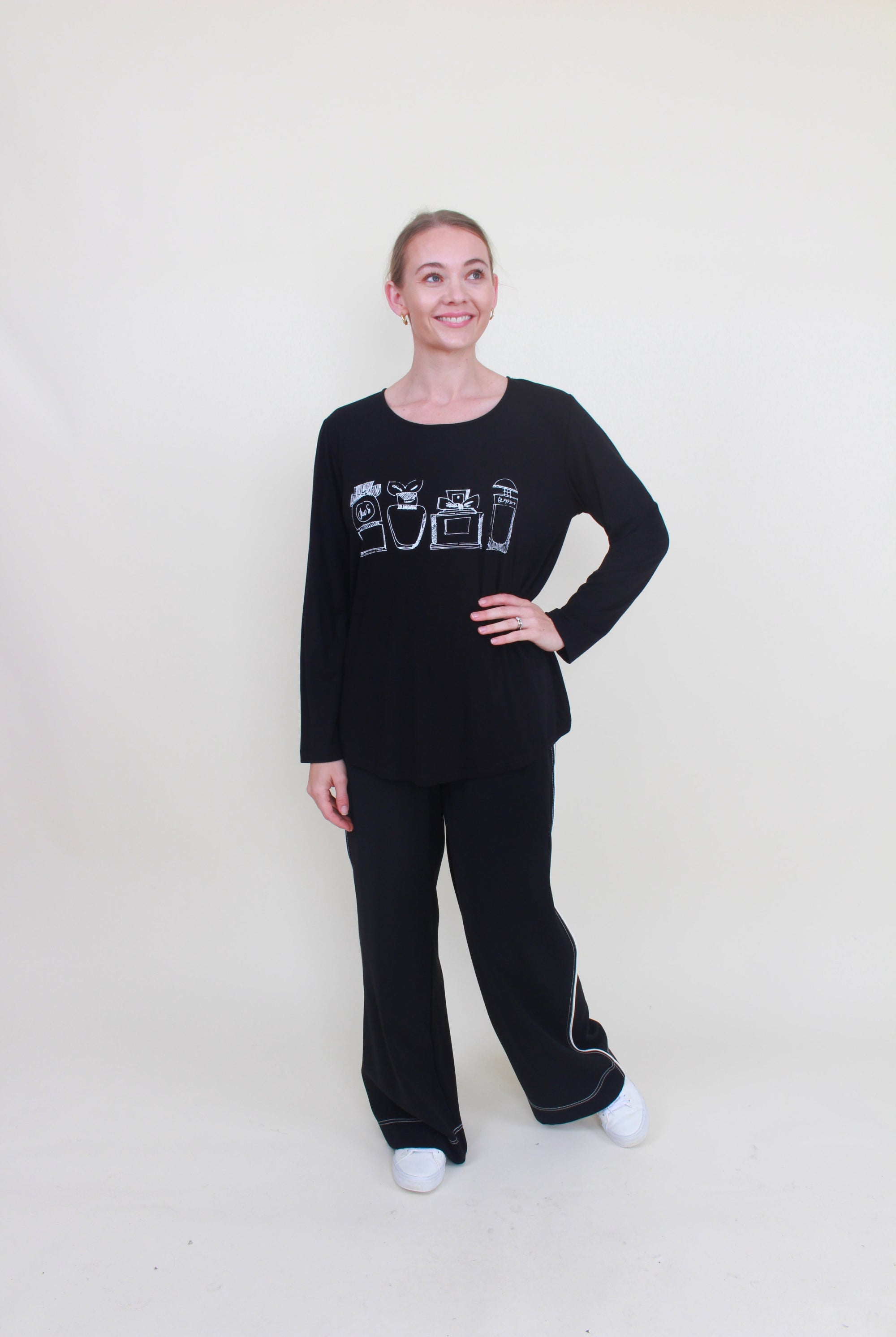 womens curve hem top black with purfume bottle print