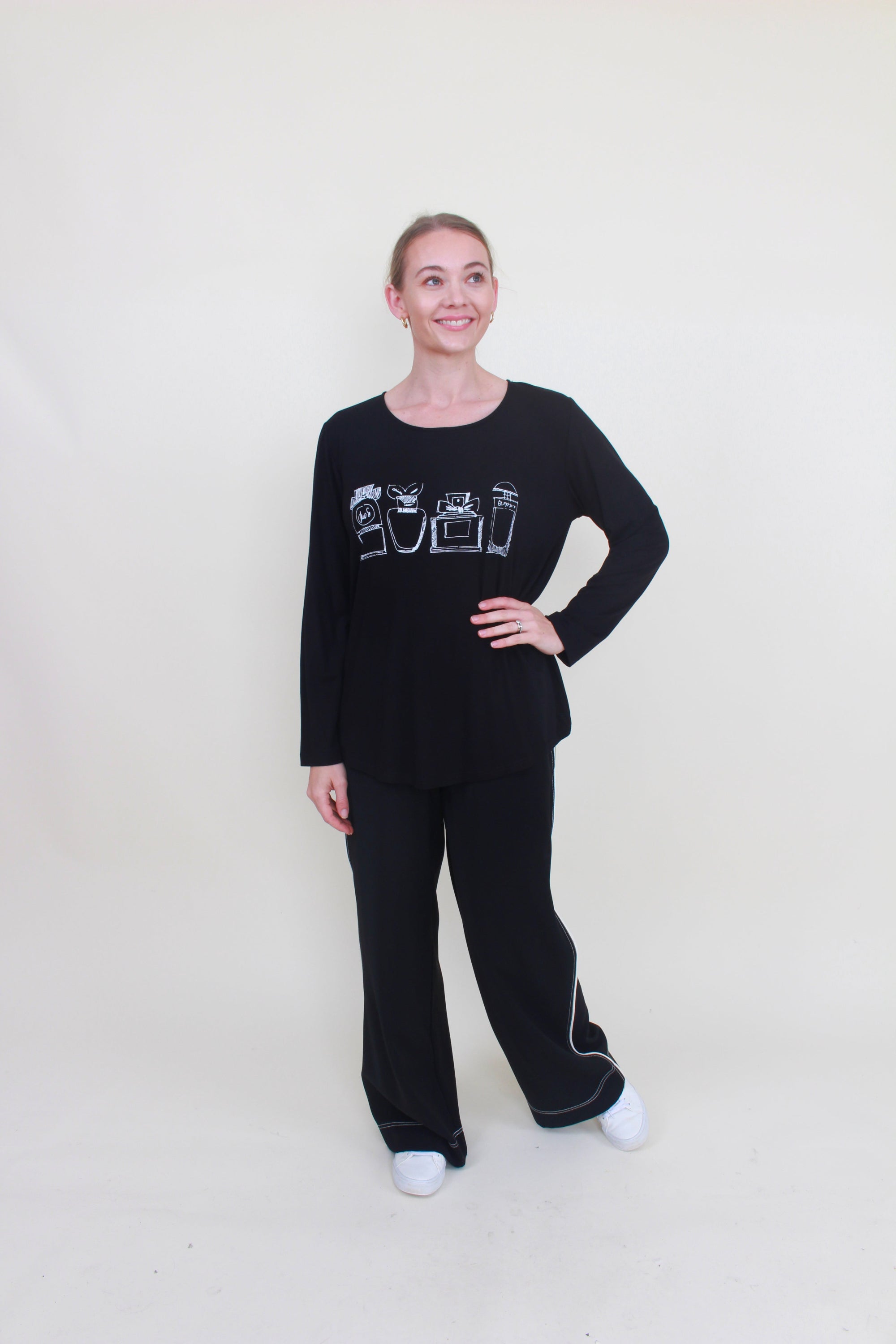 womens curve hem top black with purfume bottle print