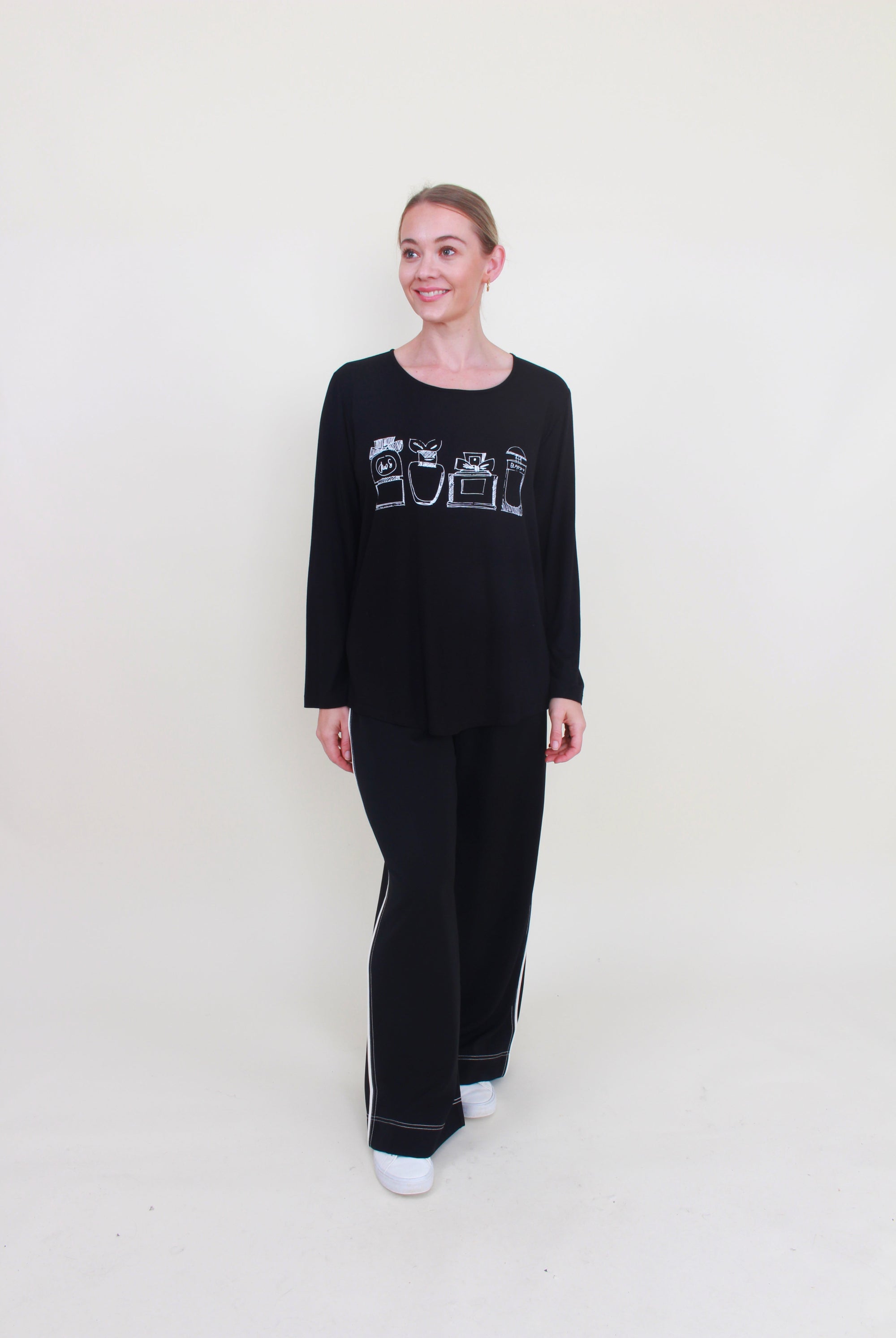 womens curve hem top black with purfume bottle print