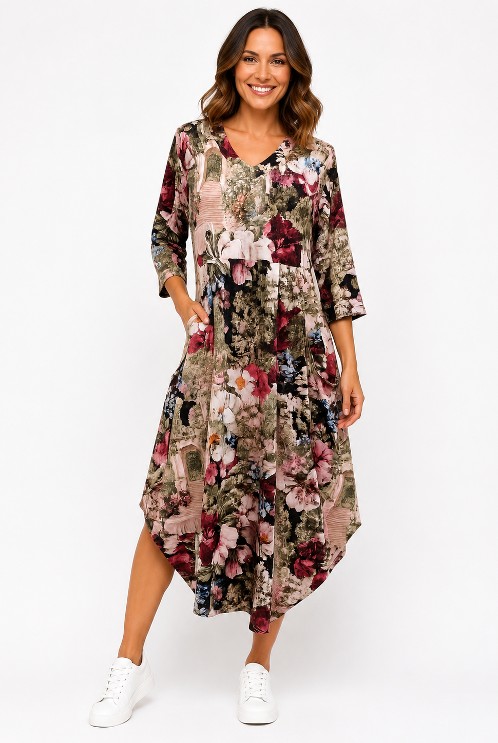 Woman wearing a floral dress on a white background