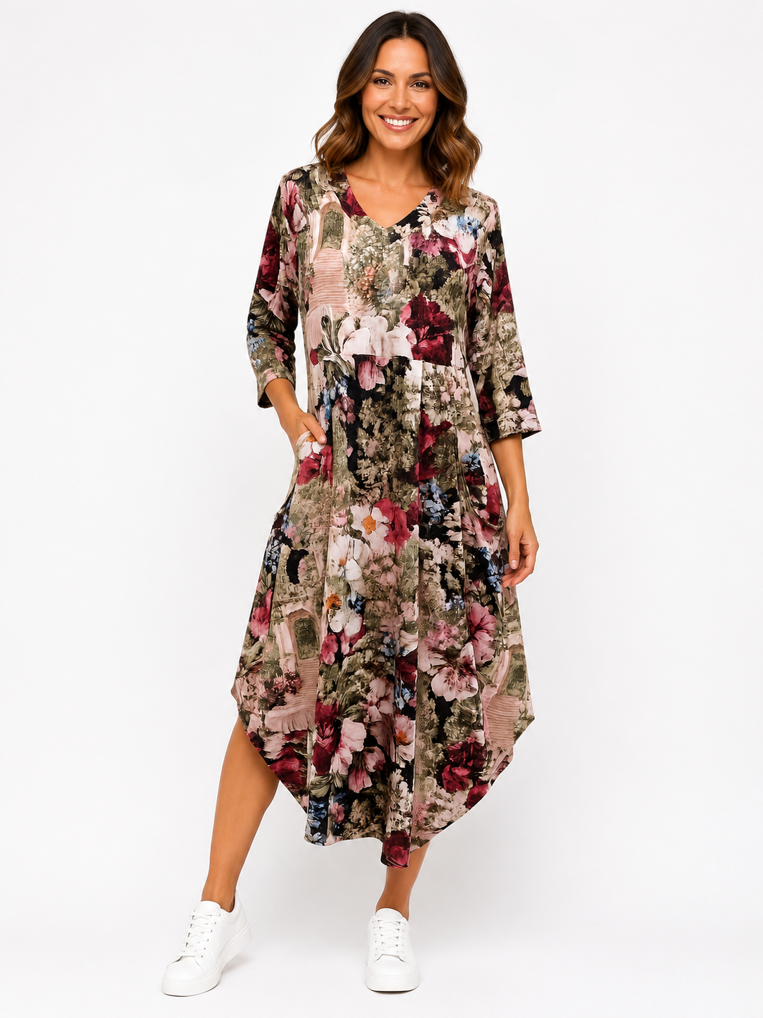 Woman wearing a floral dress on a white background