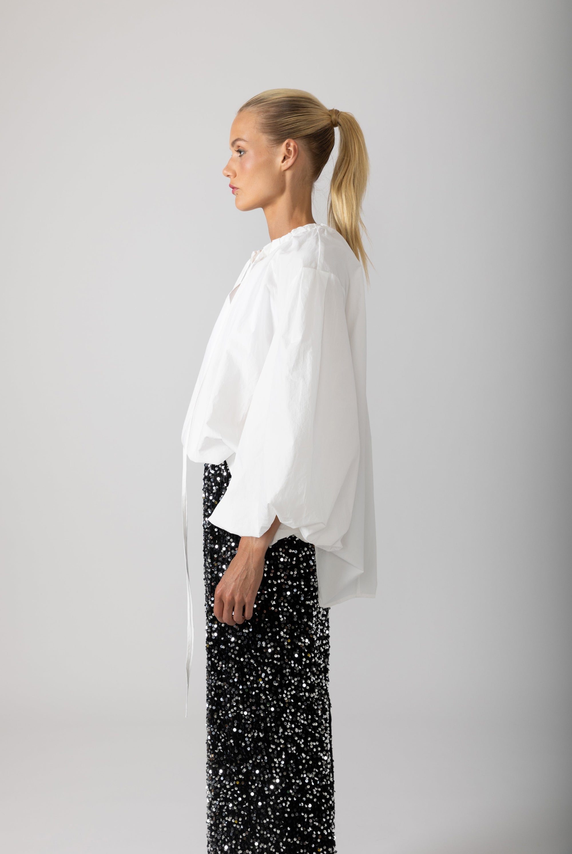 womens shirt with balloon sleeves and ruffles white side view