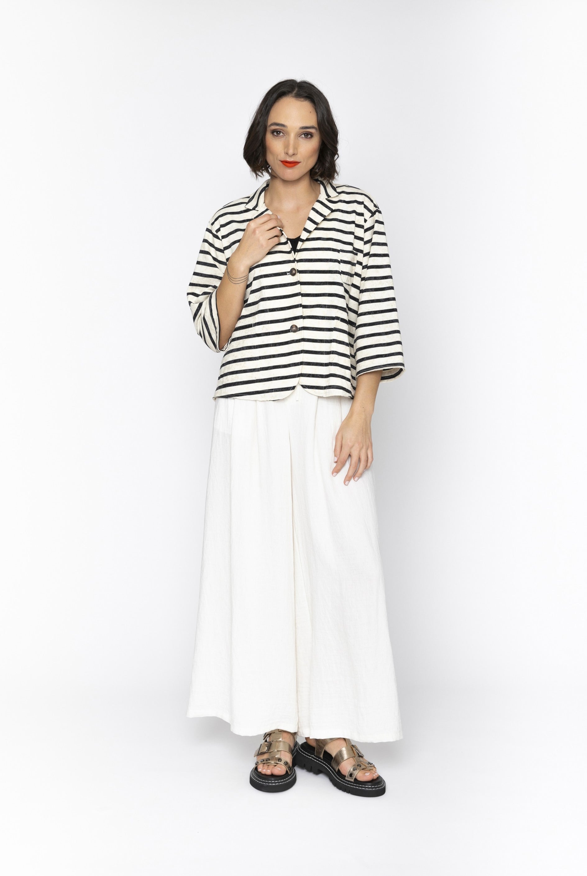 Womens white wide leg pants worn by model