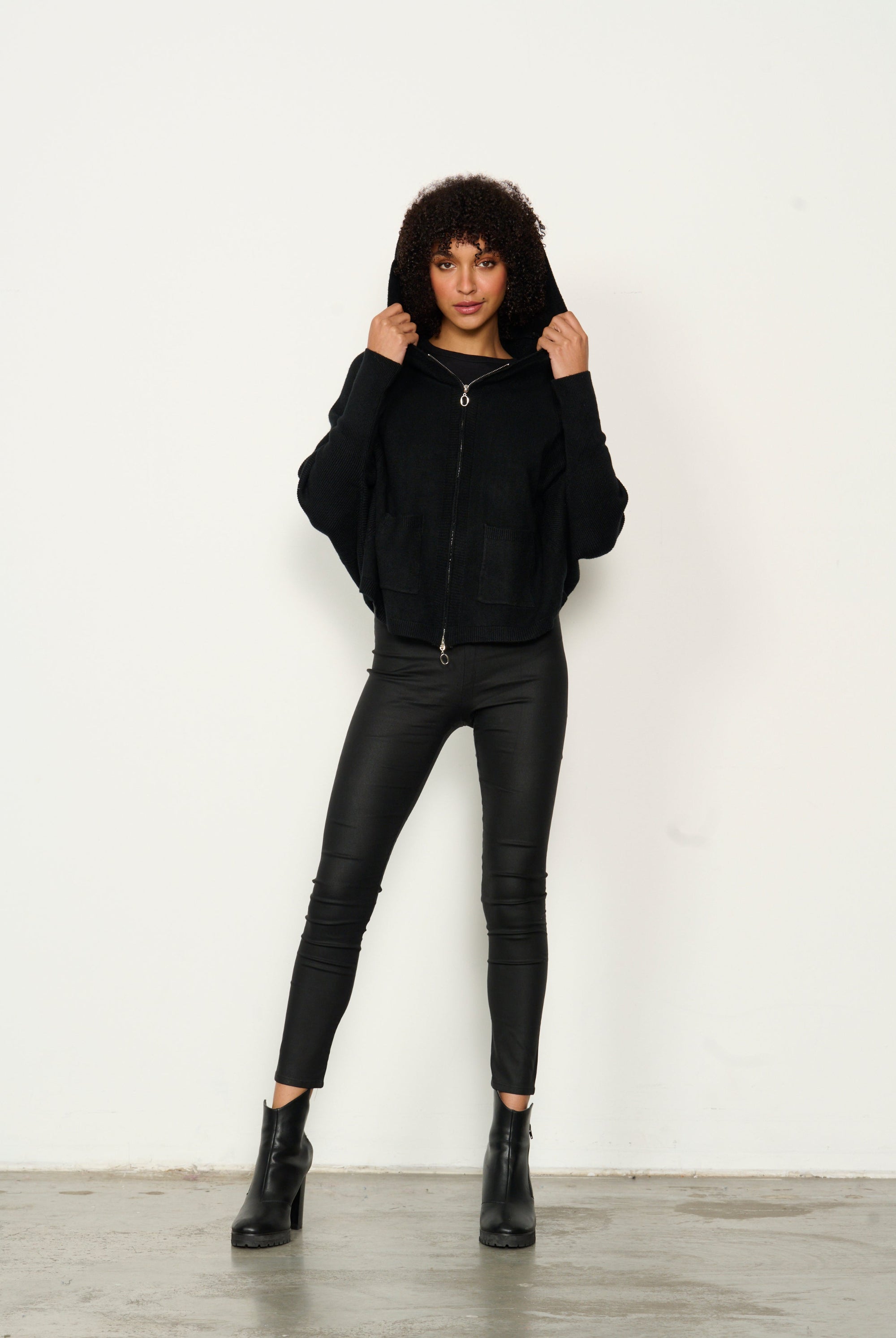 womens batwing zip through hoodie in black hood up worn by model