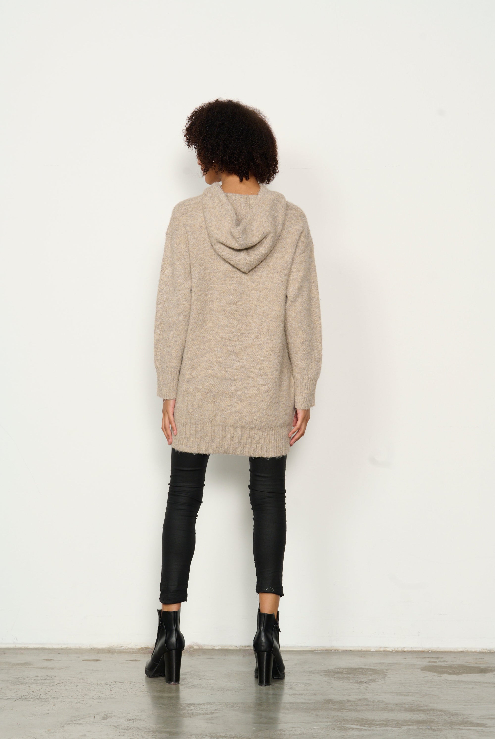 womens longline long sleeve hoodie in oat worn by model back view