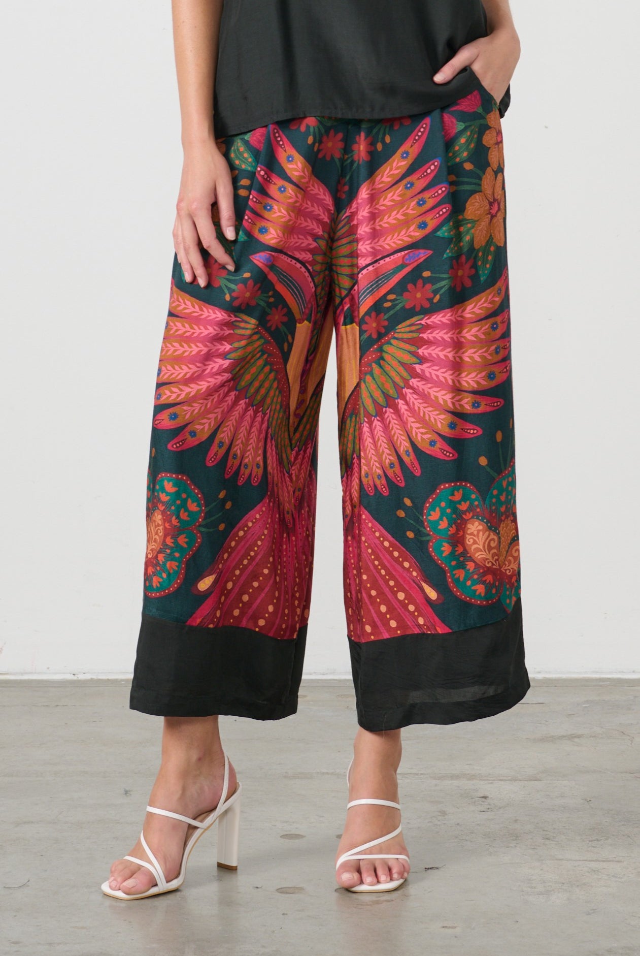 womens wide leg pant with multi toucan print worn by model