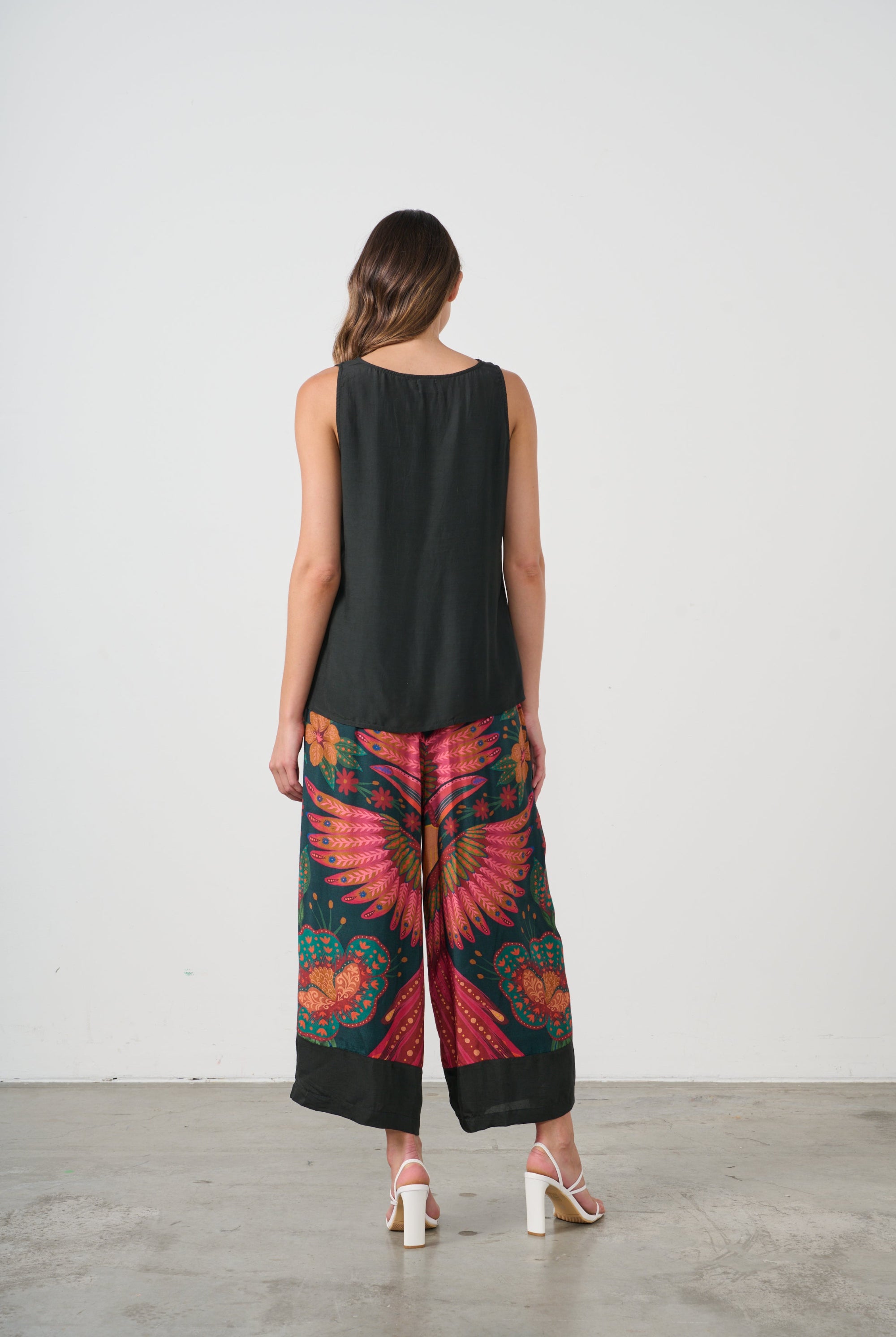 womens wide leg pant with multi toucan print worn by model back view
