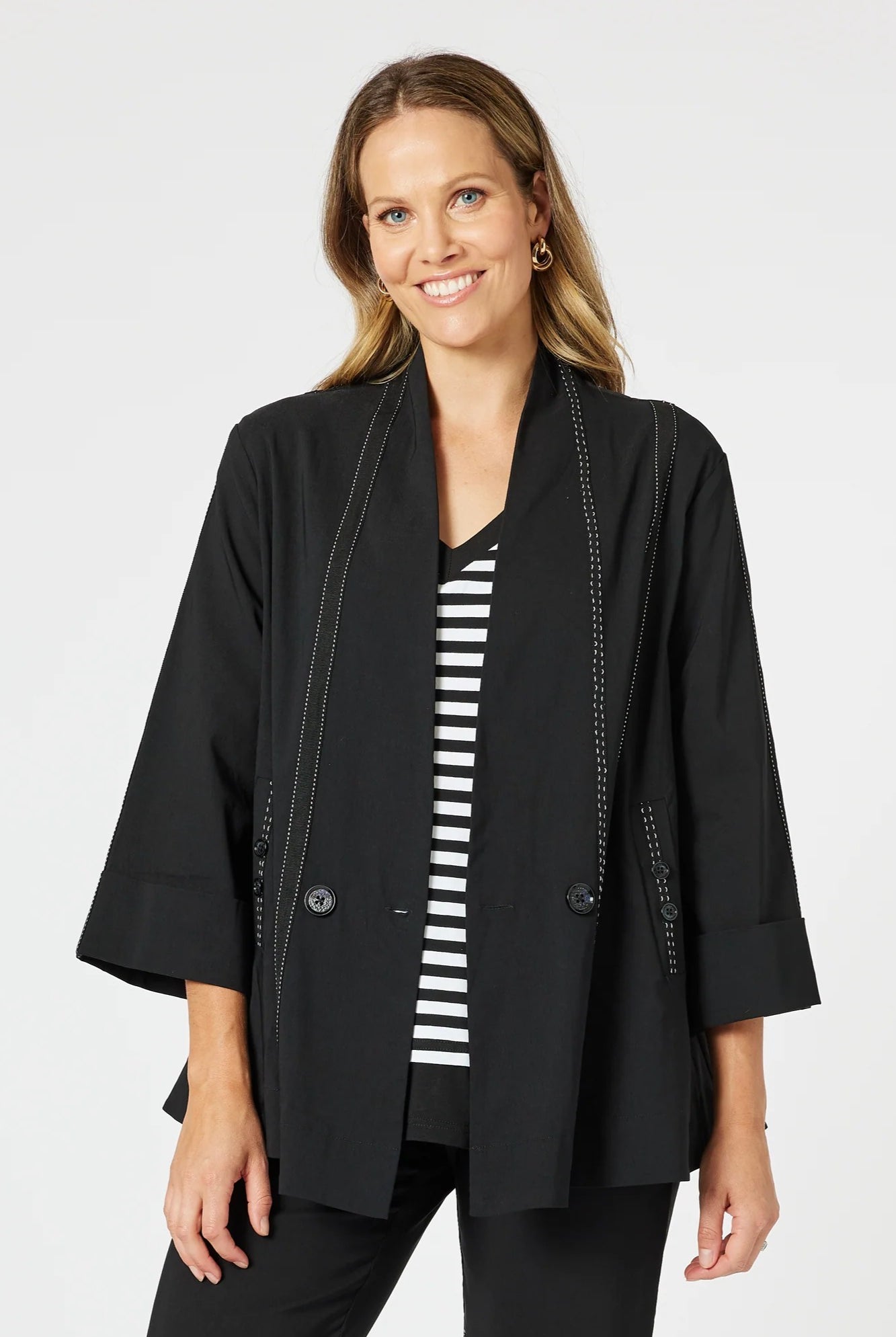 womens black jacket with white stitching details