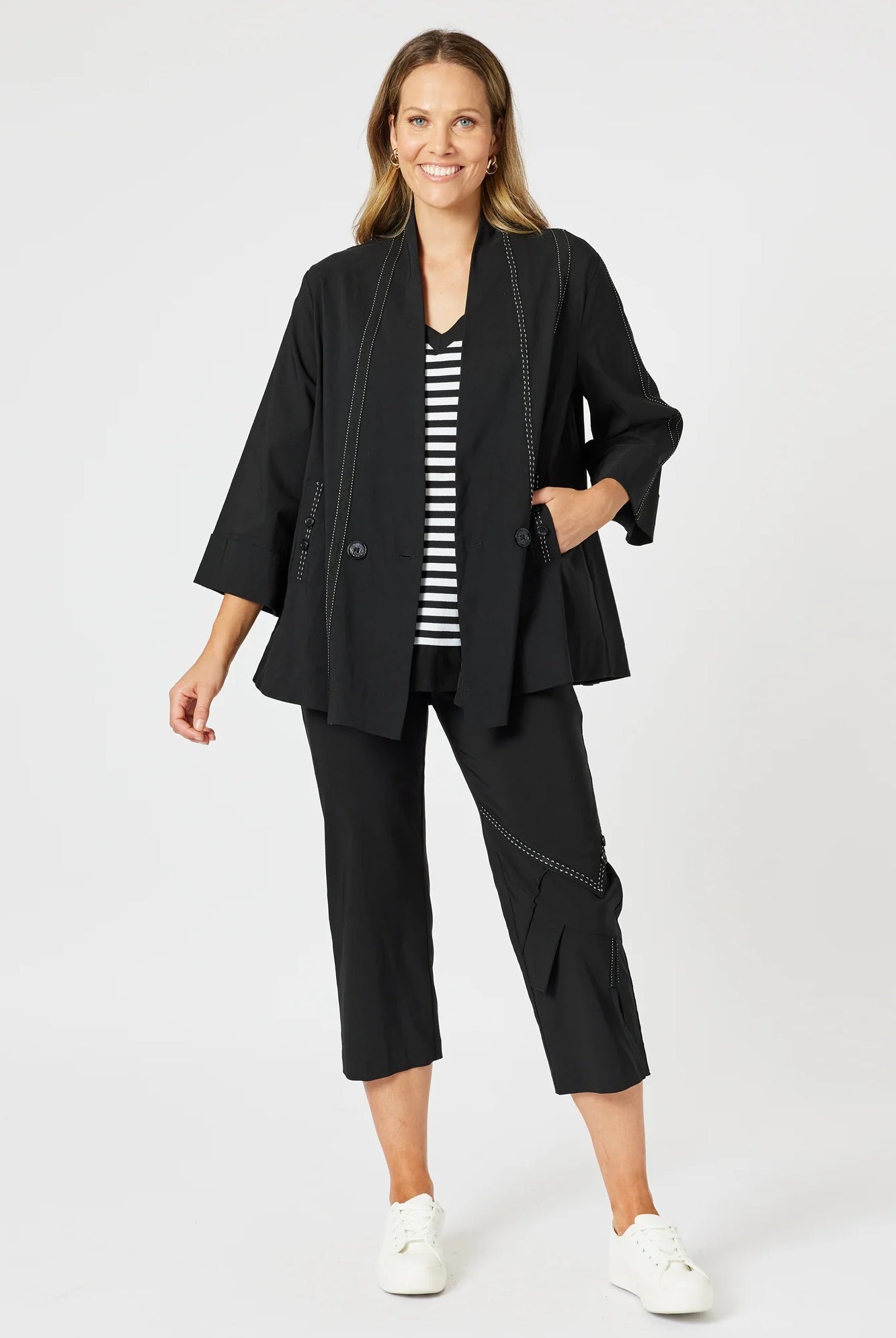 womens black jacket with white stitching details