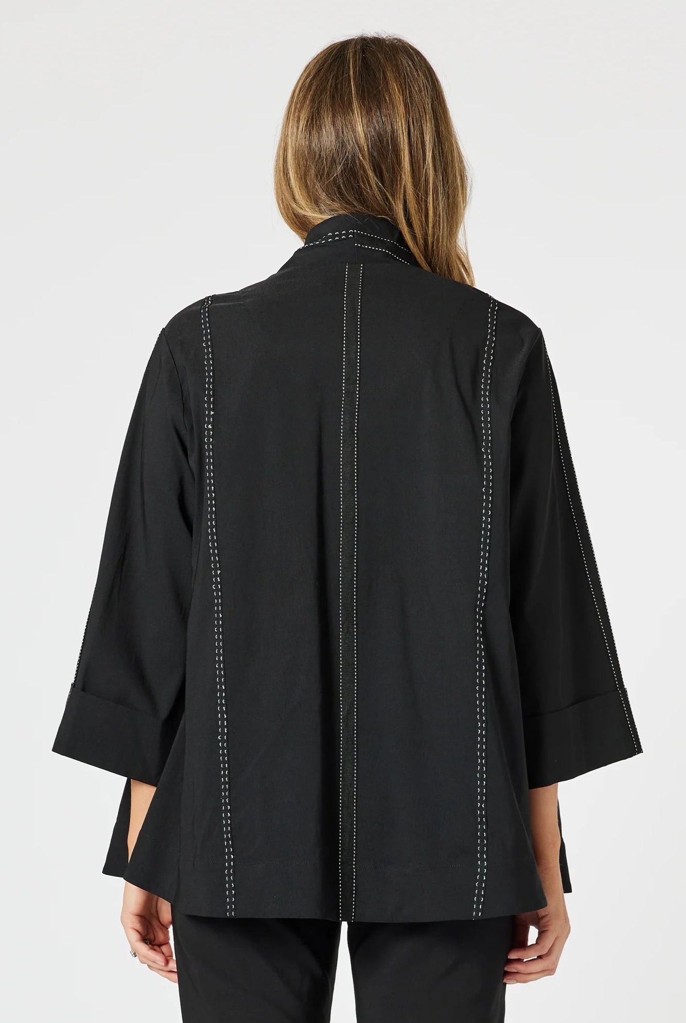 womens black jacket with white stitching details back view