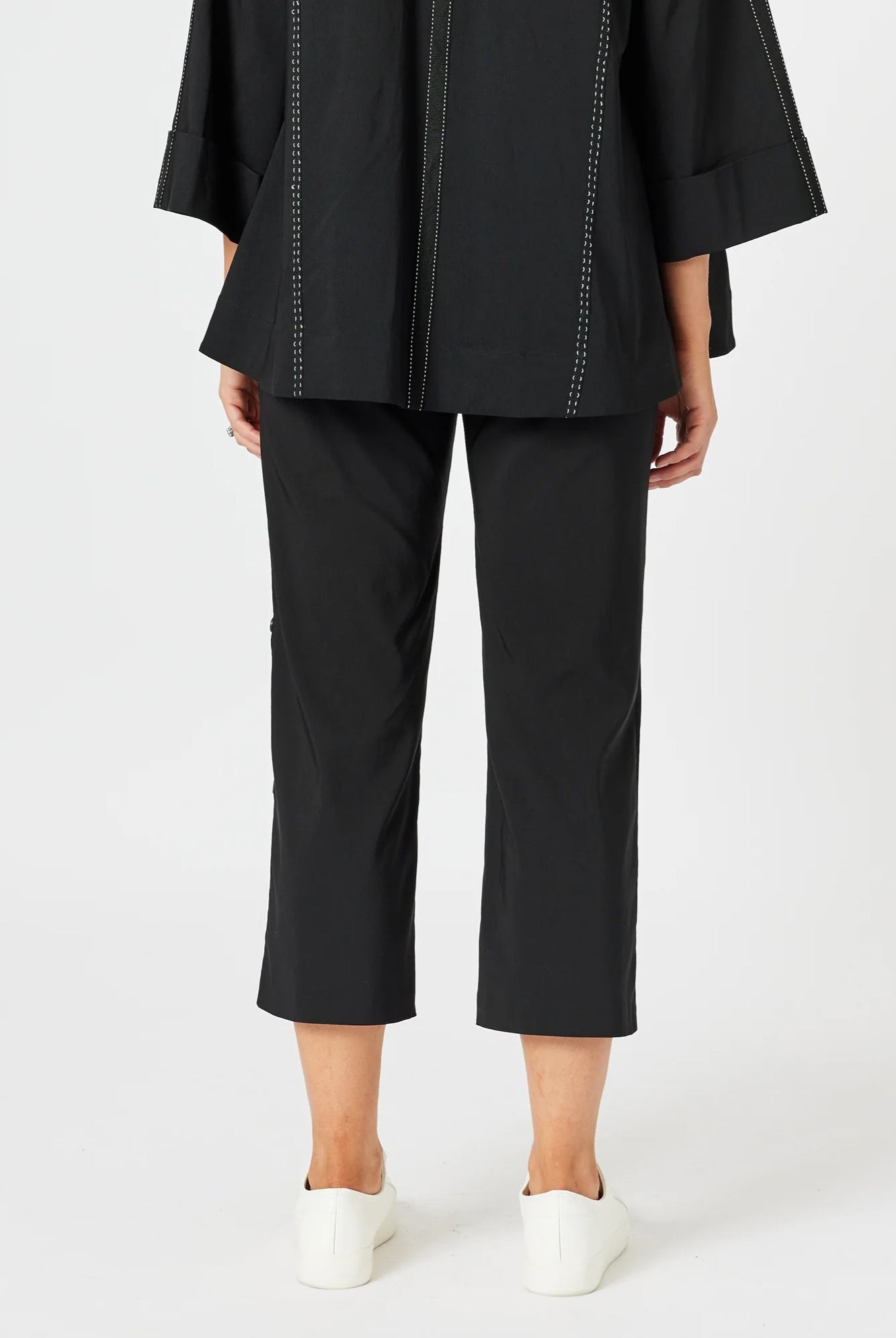 womens cropped black pant with white stitching back view