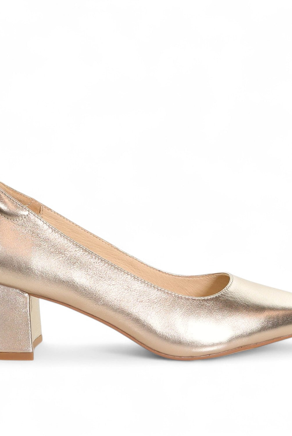 Gold metallic high heel shoe on a white background