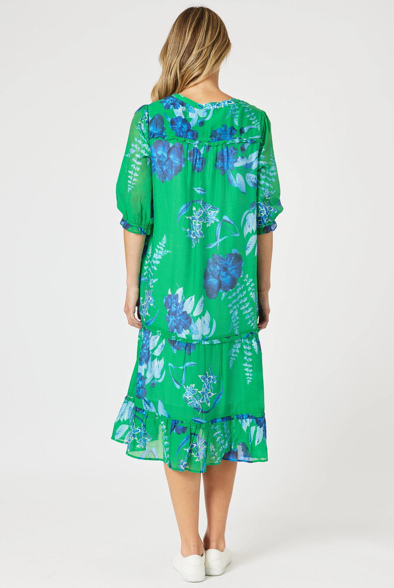 womens midi dress with soft pleating v neckline in green and blue floral print back view