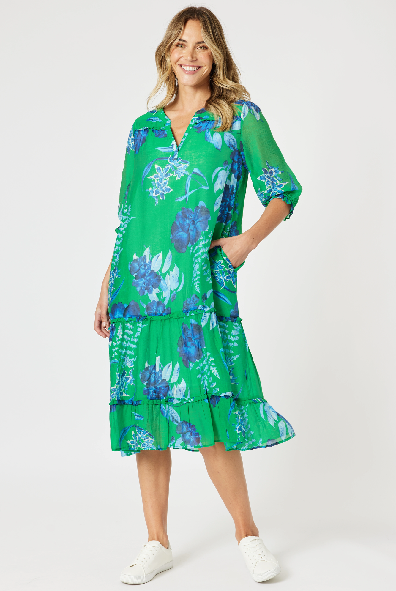 womens midi dress with soft pleating v neckline in green and blue floral print