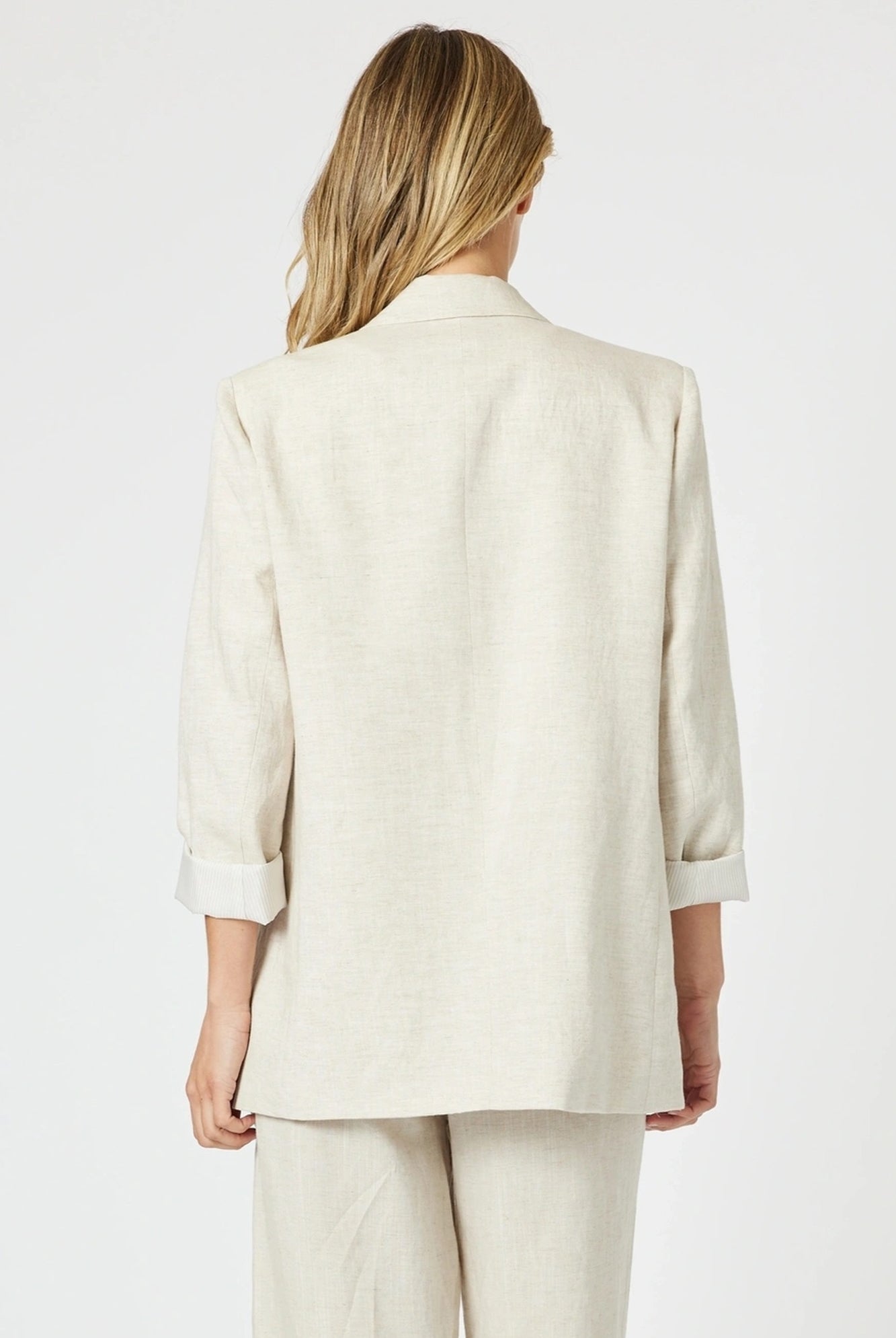 womens relaxed classic blazer in natural stone worn by model back view