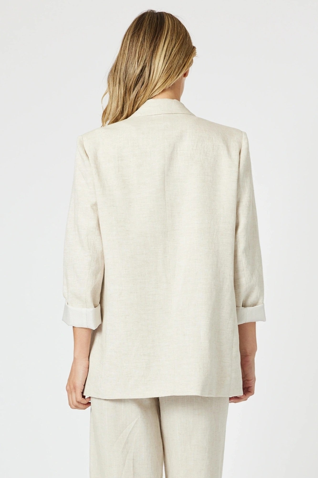 womens relaxed classic blazer in natural stone worn by model back view
