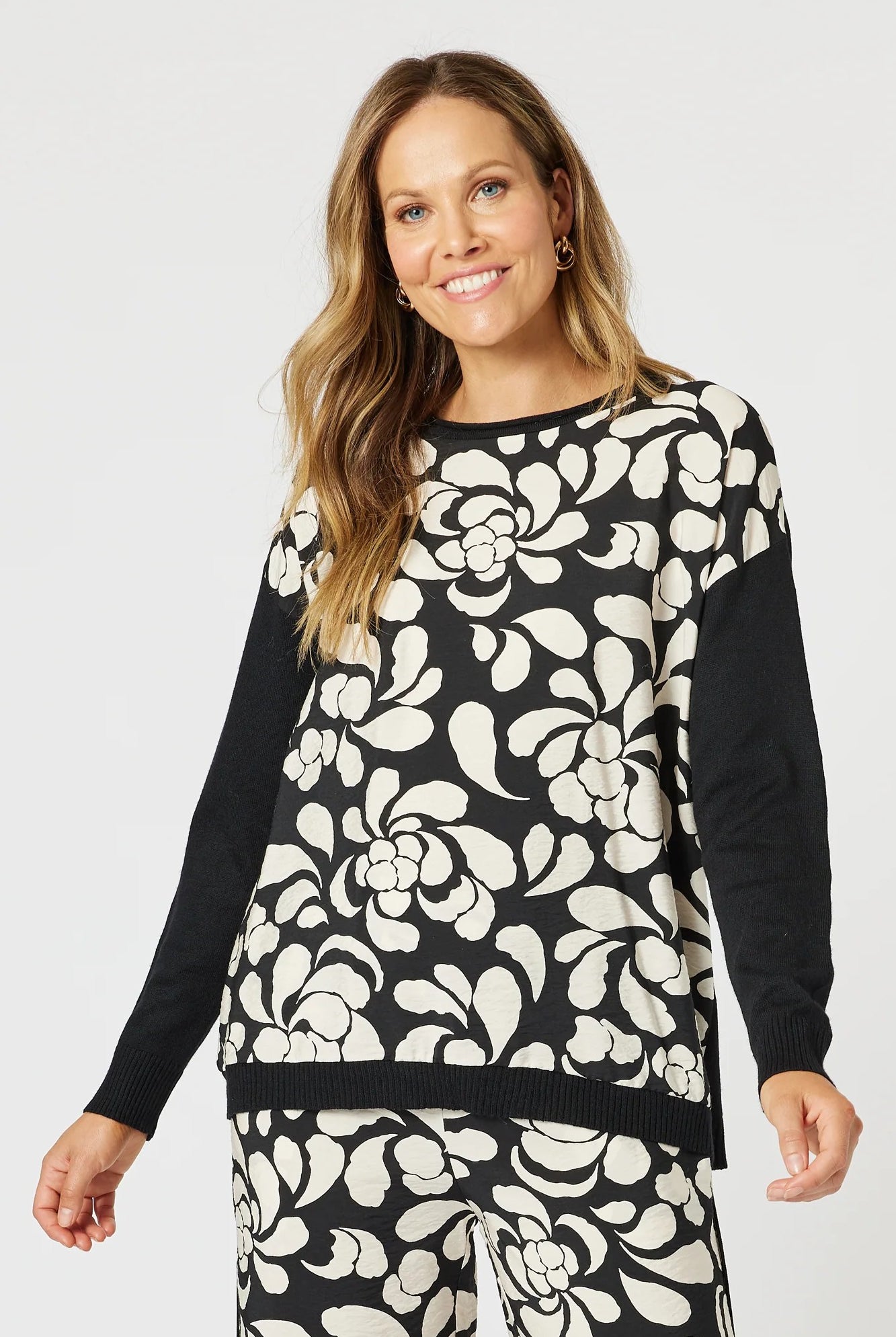 womens knit top with black and white floral contrast long sleeve