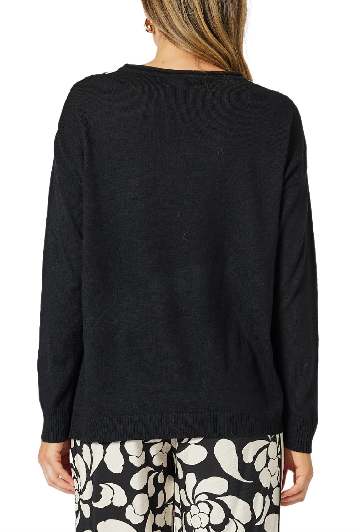 womens knit top with black and white floral contrast long sleeve back view