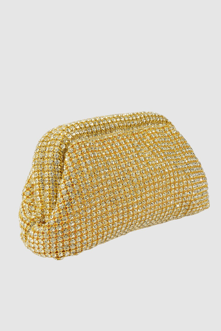 Gold clutch bag with rhinestone detailing on a light gray background