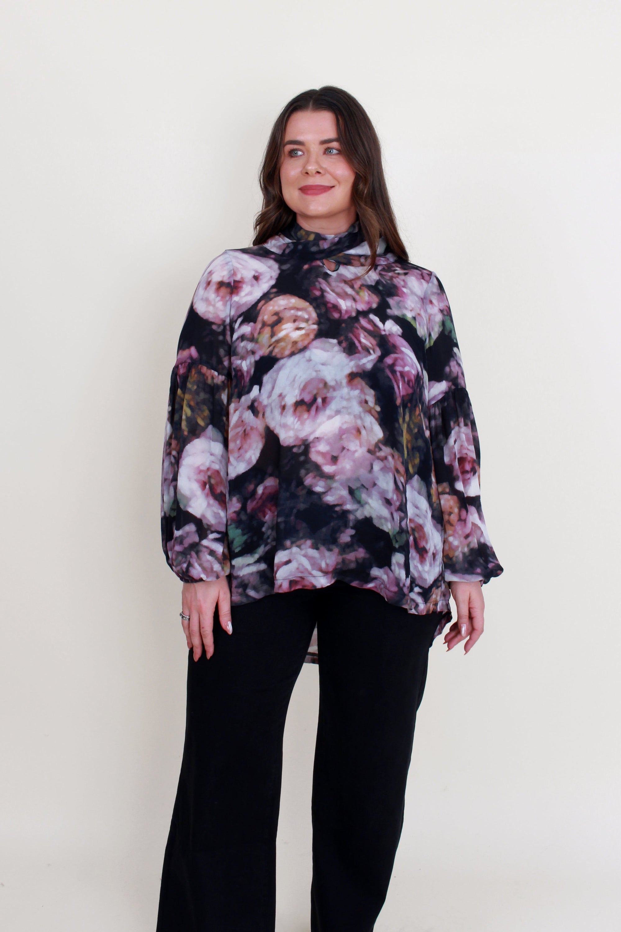 womens floral blouse with neck tie worn by model