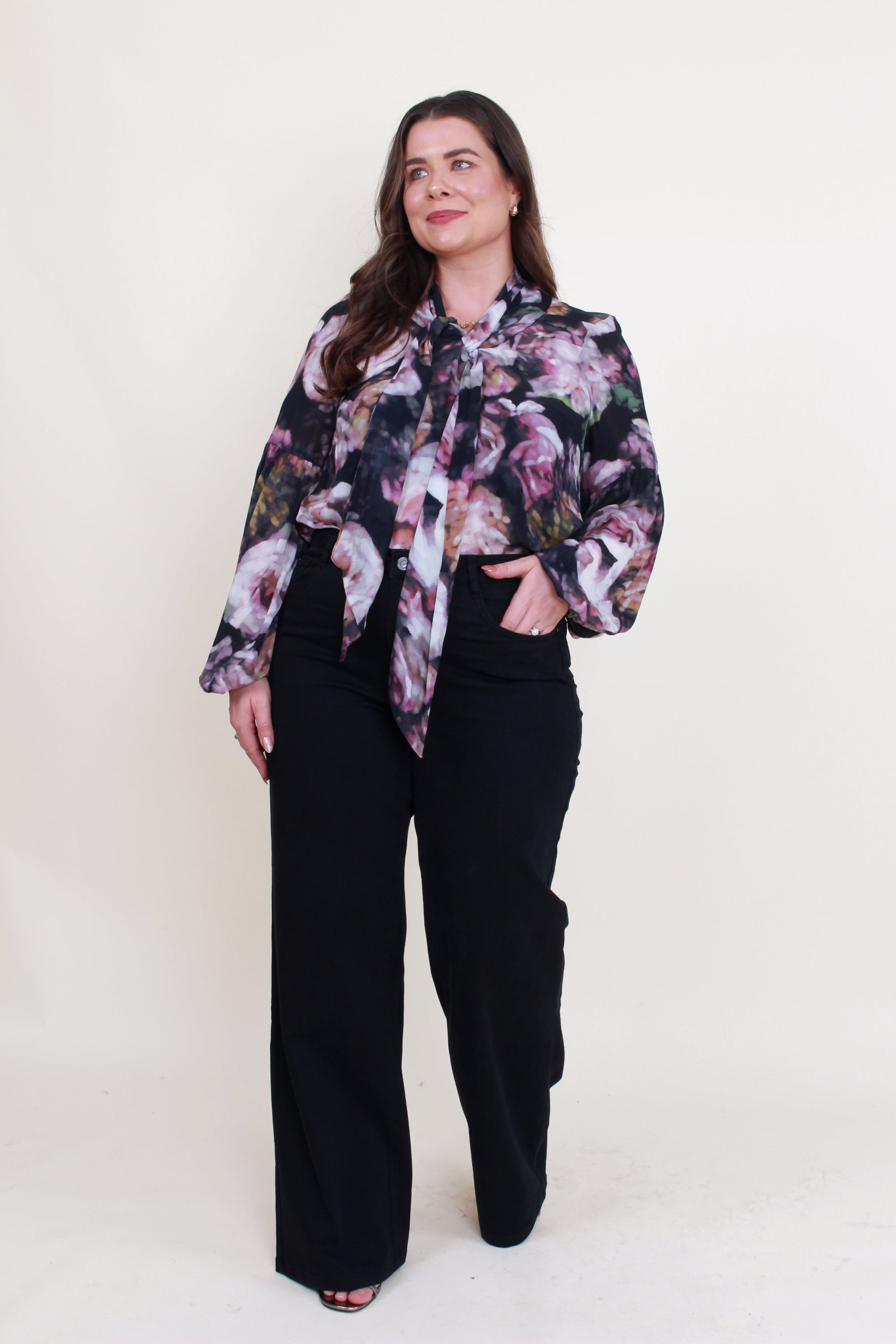womens floral blouse with neck tie worn by model