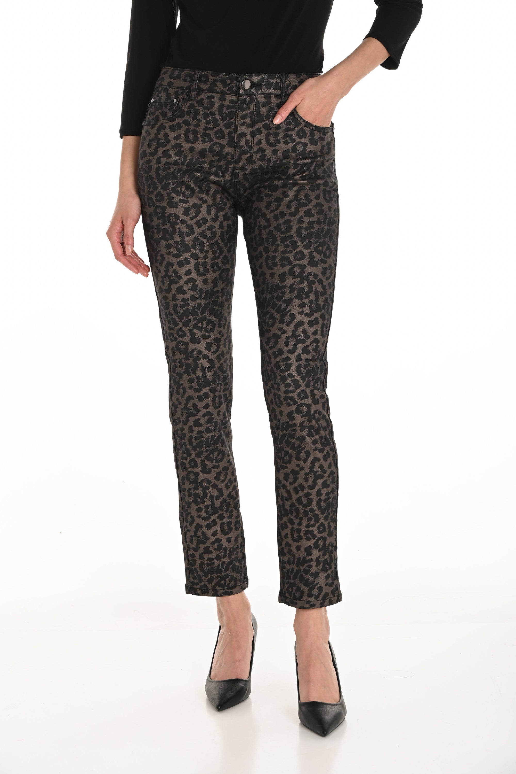 Leopard print pants worn by a person on a white background
