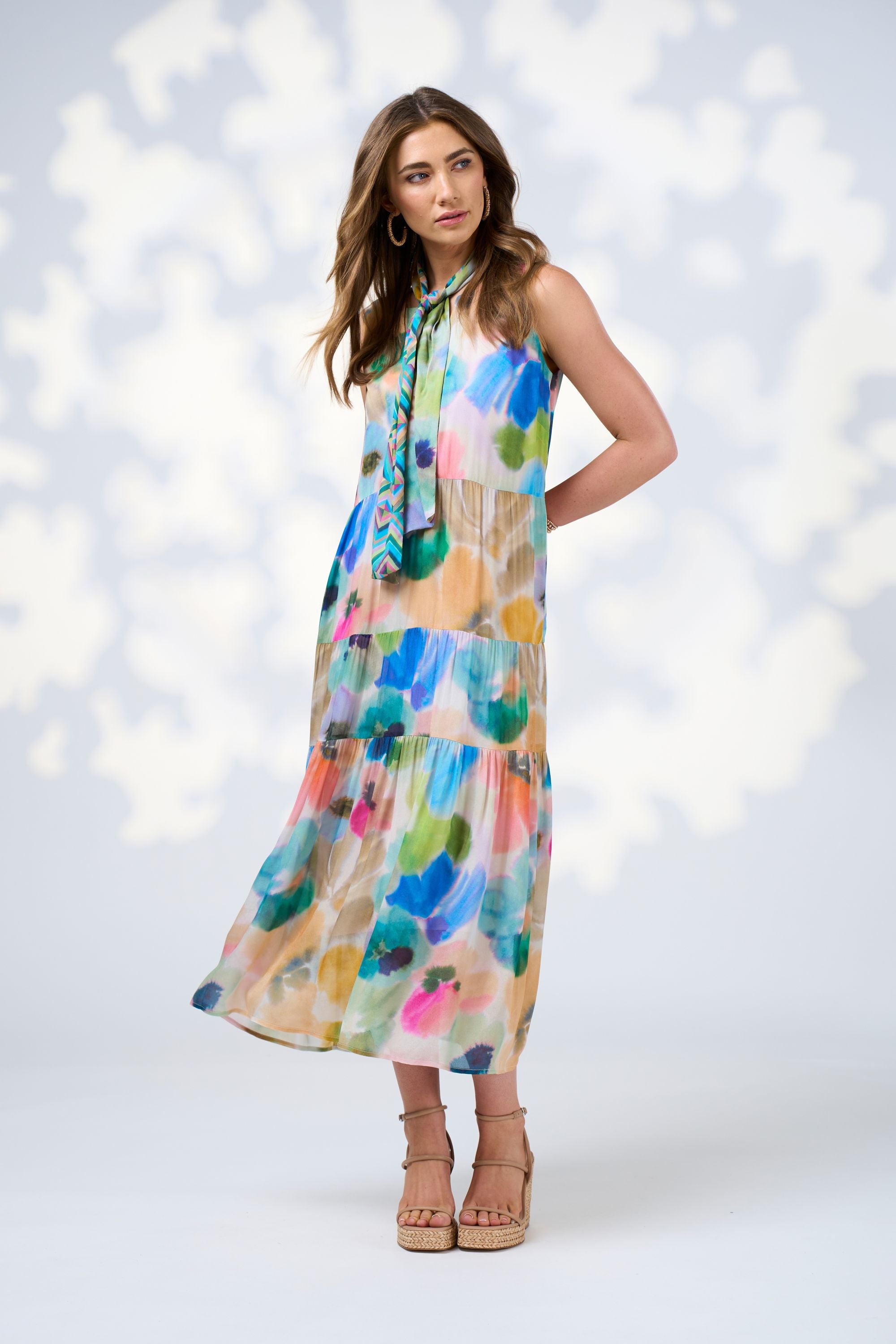 watercolour floral tiered sleeveless midi dress worn by model