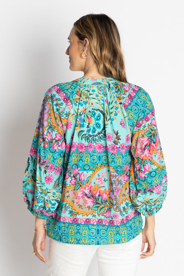 model wearing multi colour button through shirt back