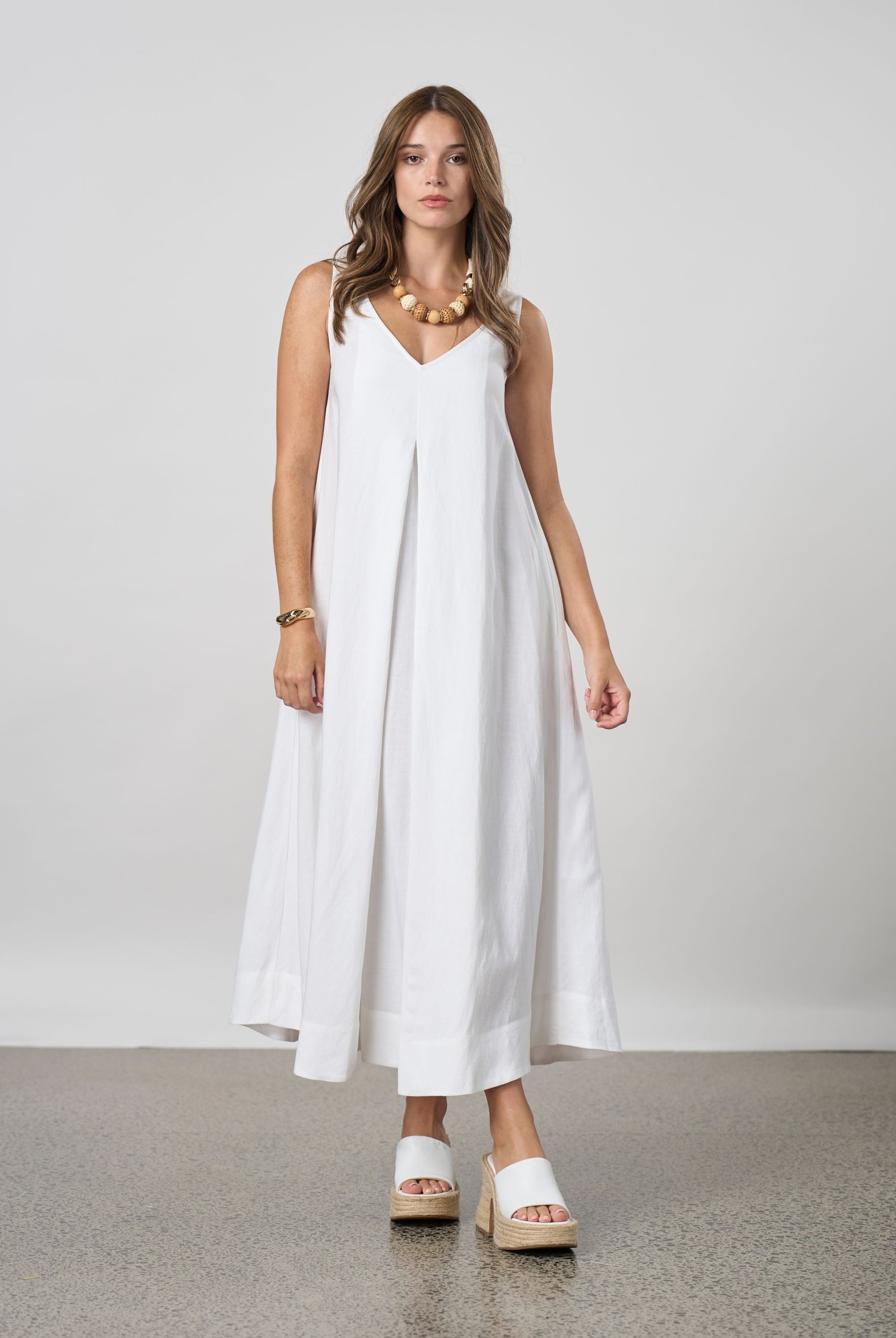 pleat maxi dress white worn by model