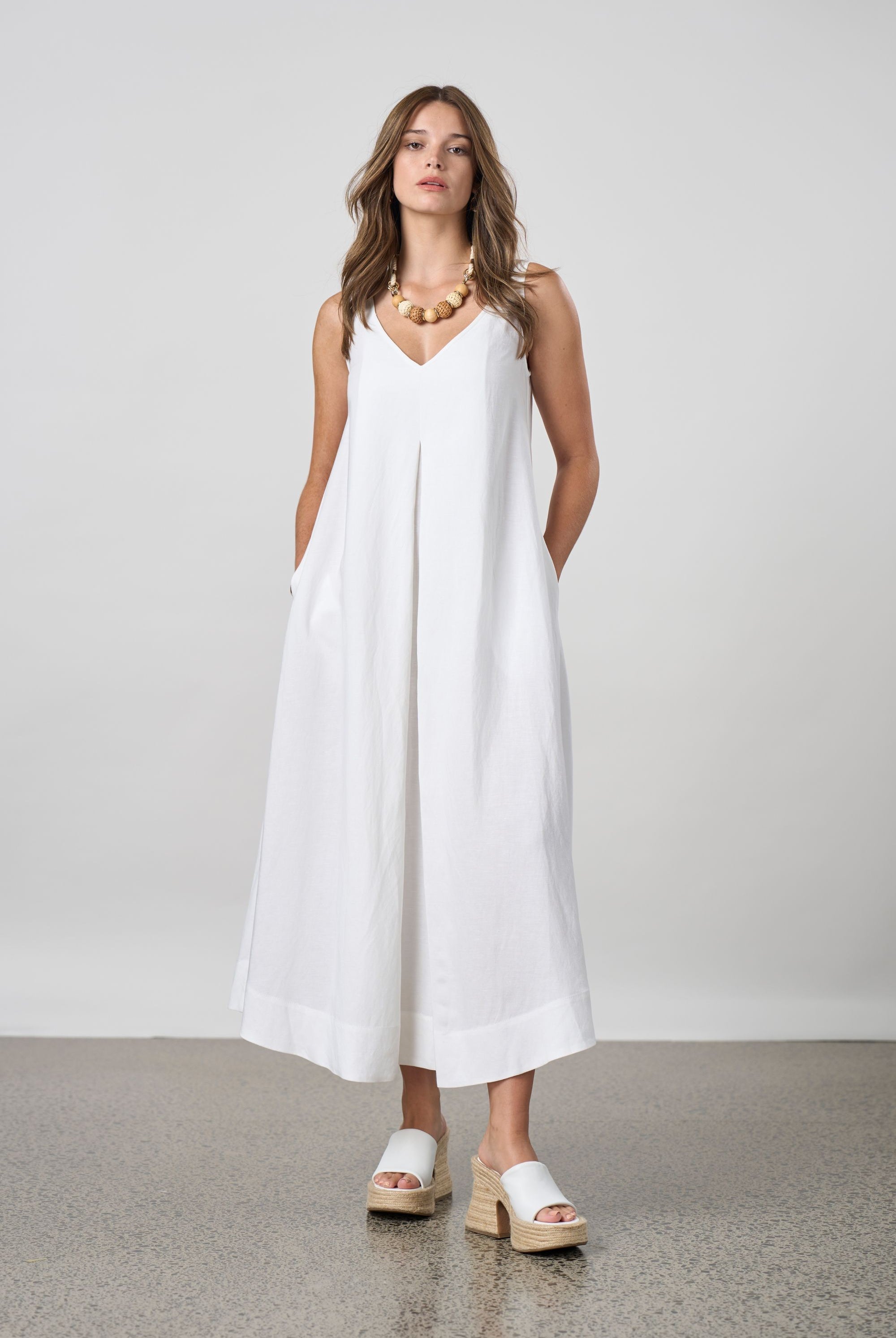 pleat maxi dress white worn by model