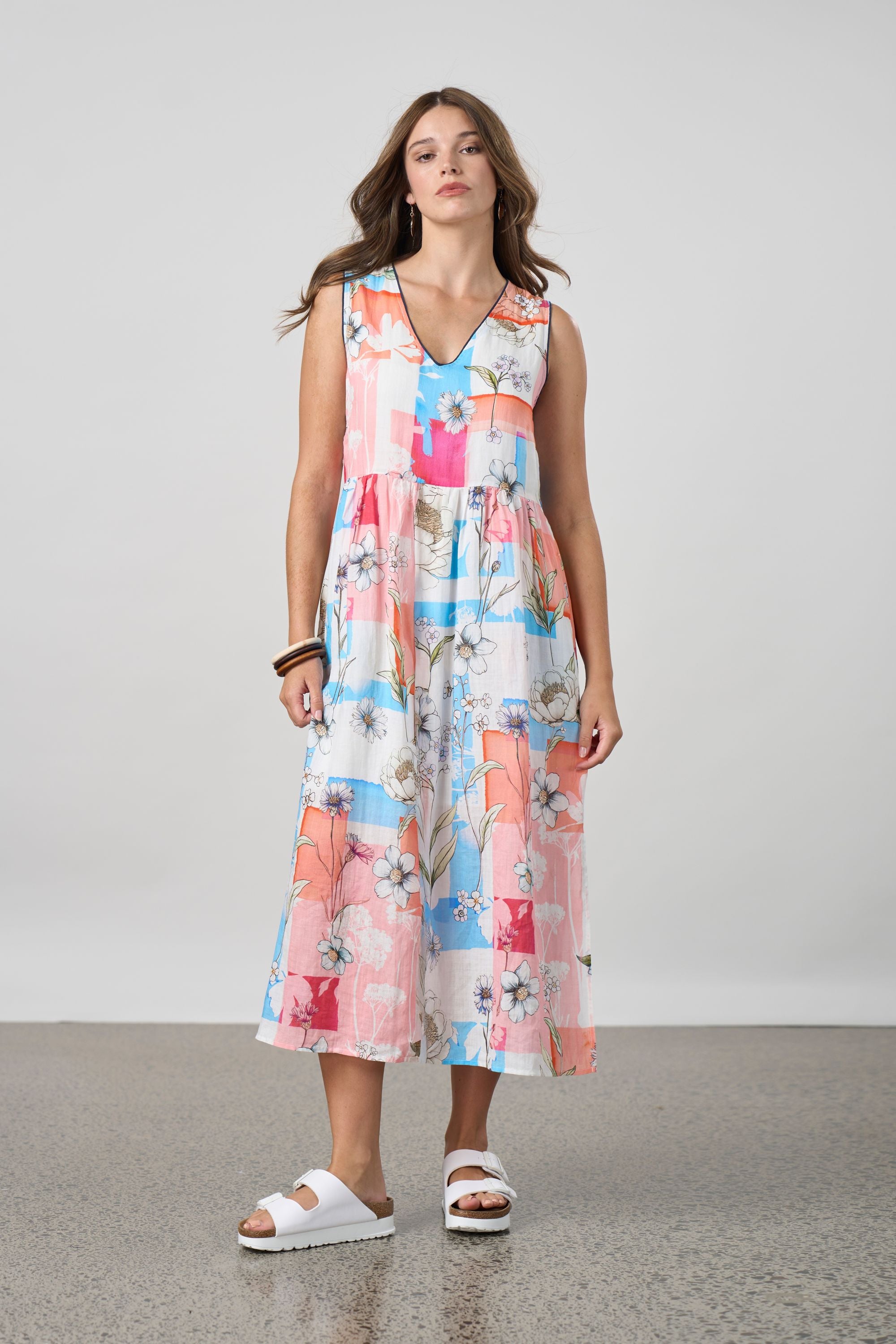 pink multi patchwork long sleeveless dress worn by model