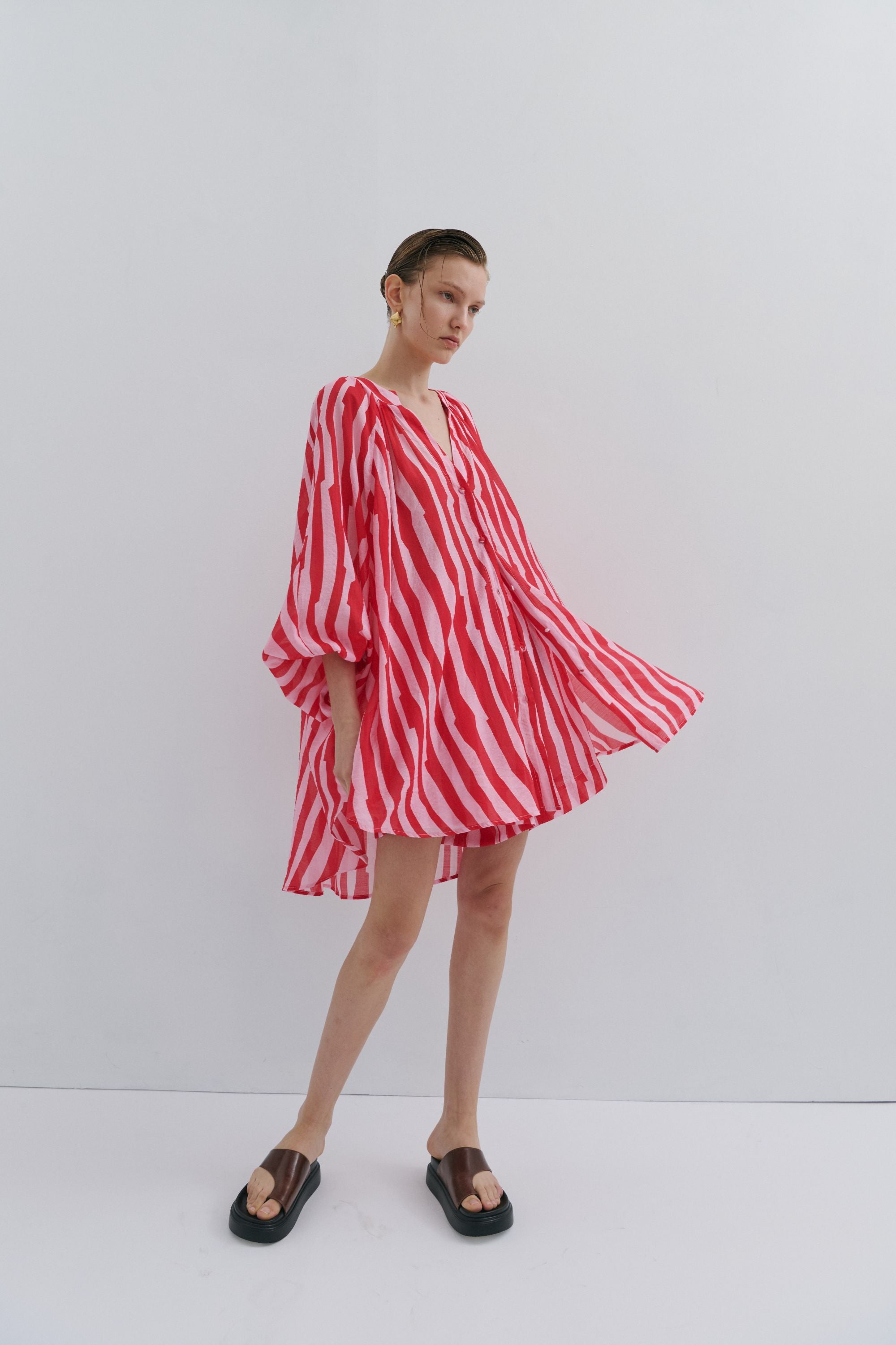 red pink stripe short dress shirt worn by model