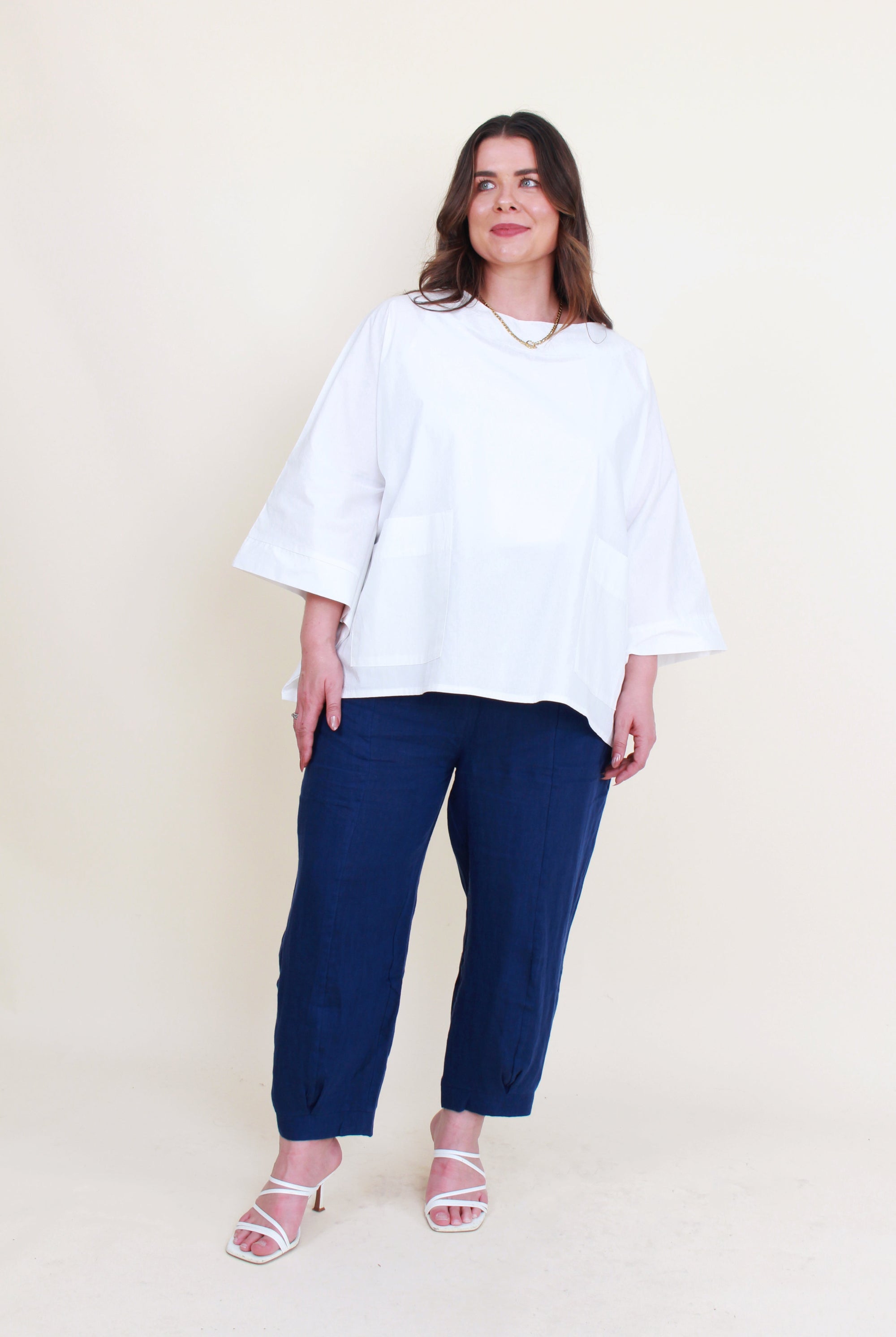 womens boxy patch pocket top in white with navy pant worn by model