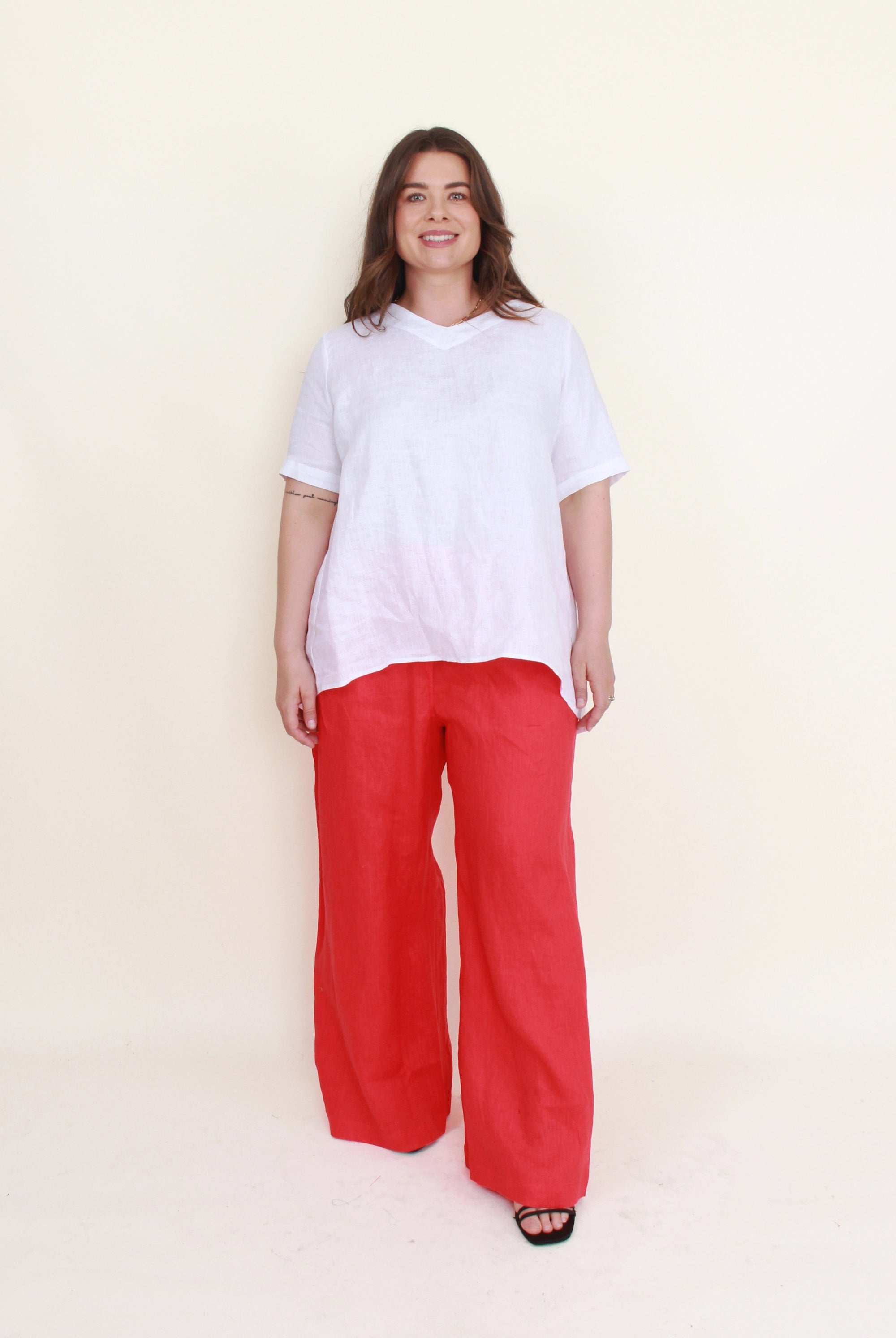 womens cocoon linen pant in red with white top worn by model