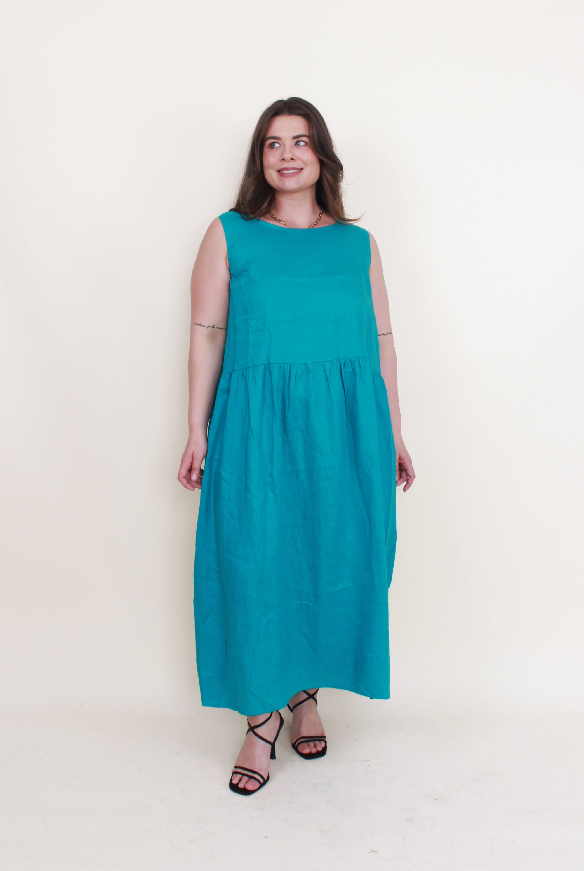 sleeveless linen midi dress jade green worn by model