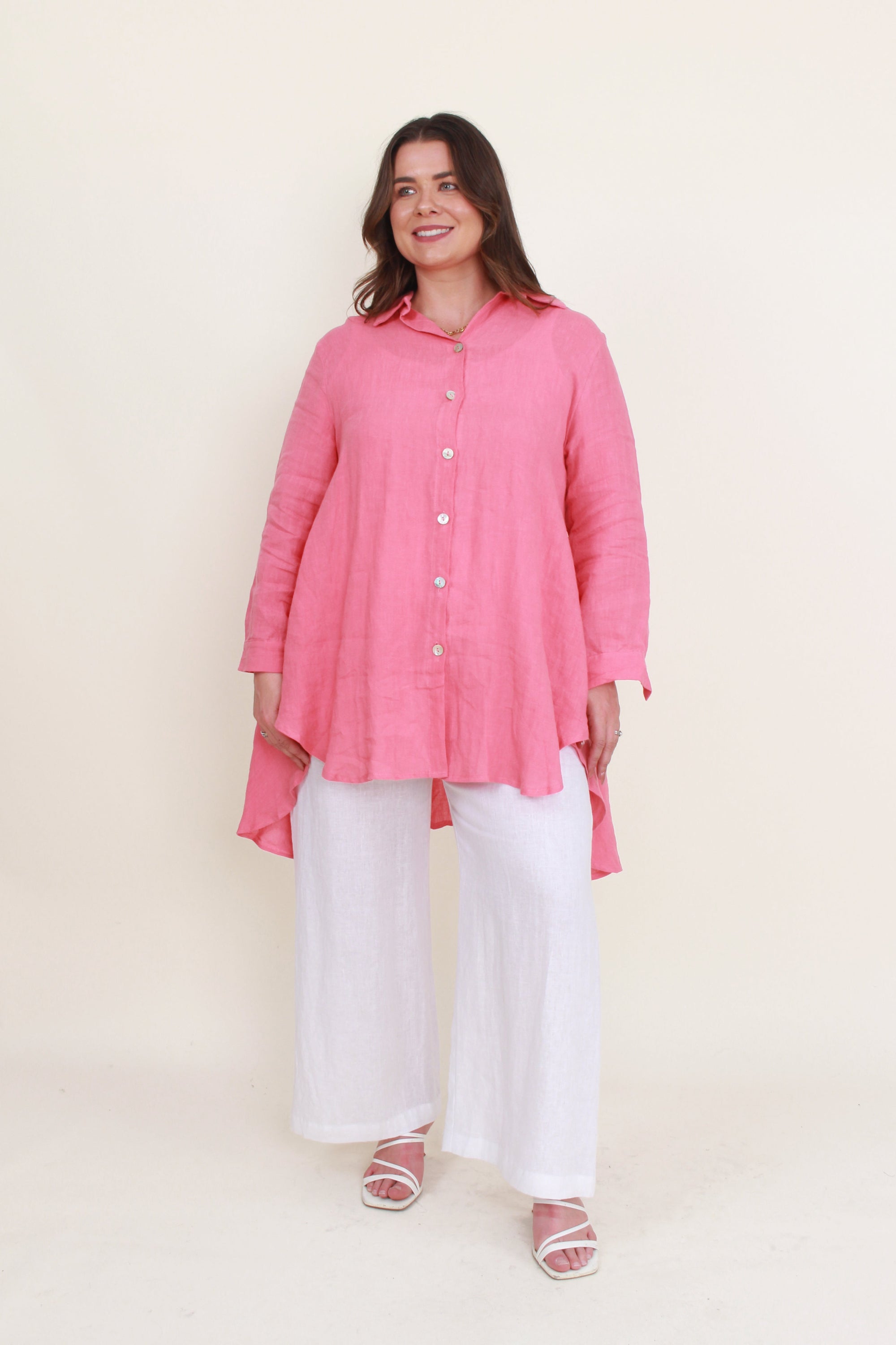 womens high low swing button through top in melon worn by model