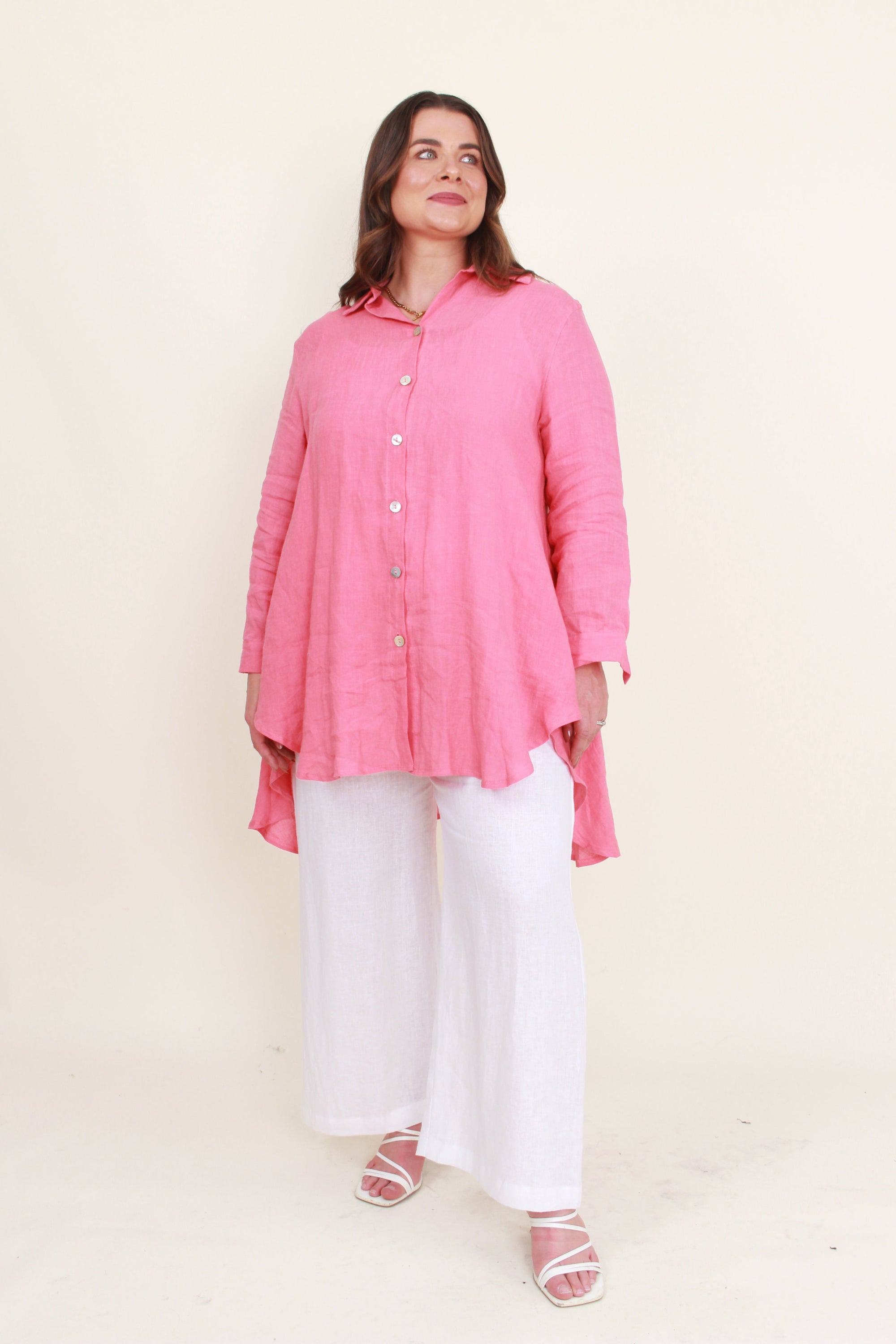 womens high low swing button through top in melon worn by model