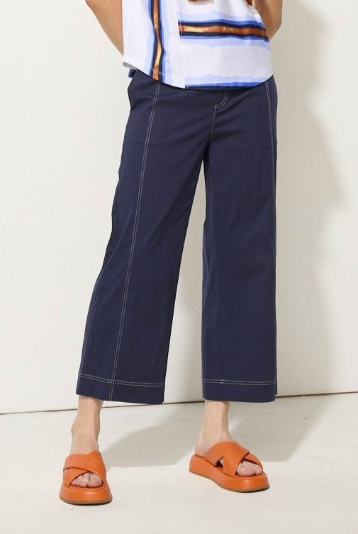 womens wide leg pant in ink with white topstitching worn by model