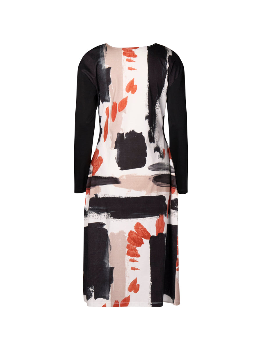 Long-sleeve dress with abstract pattern on a white background