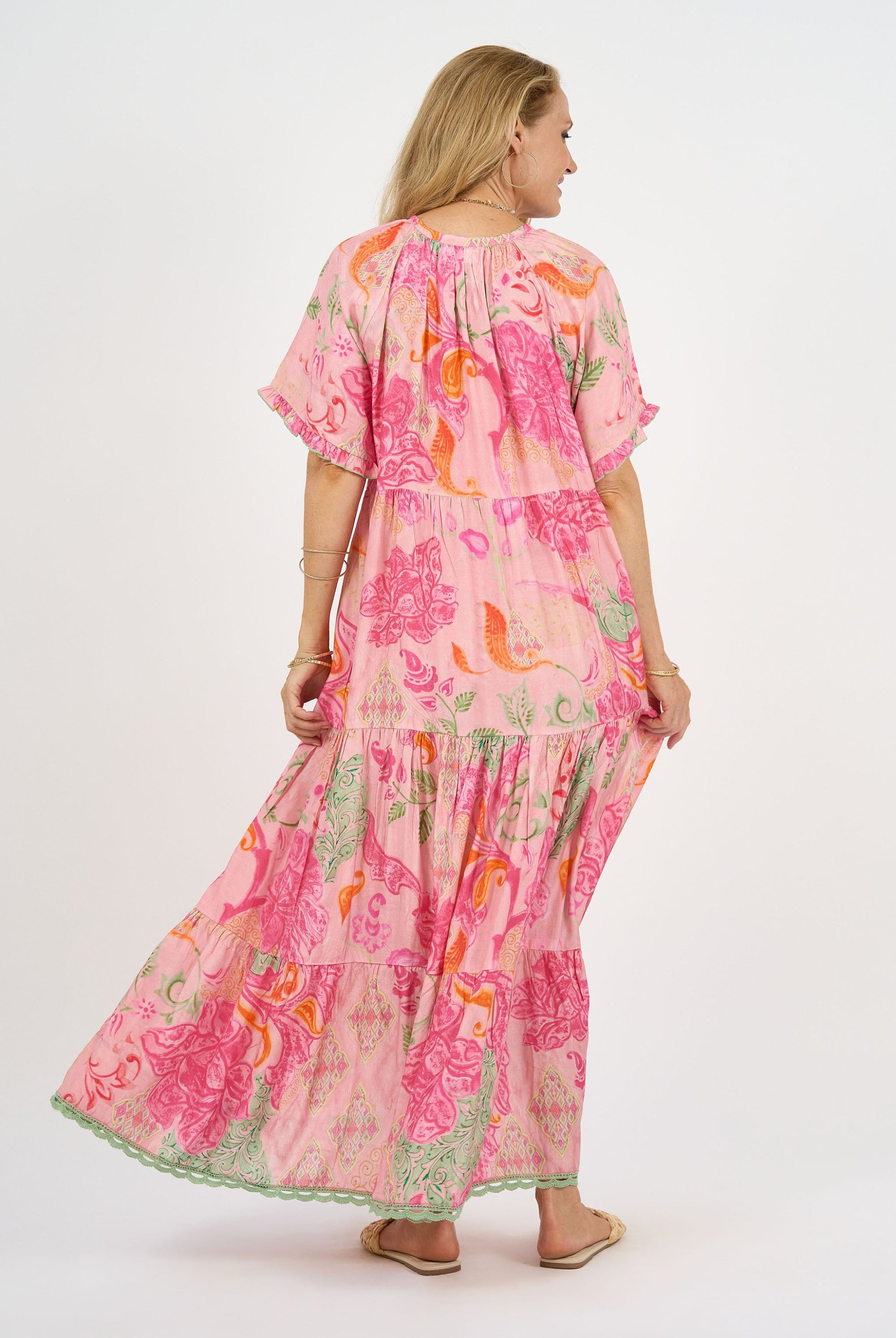 womens maxi dress boho pink floral worn by model back view