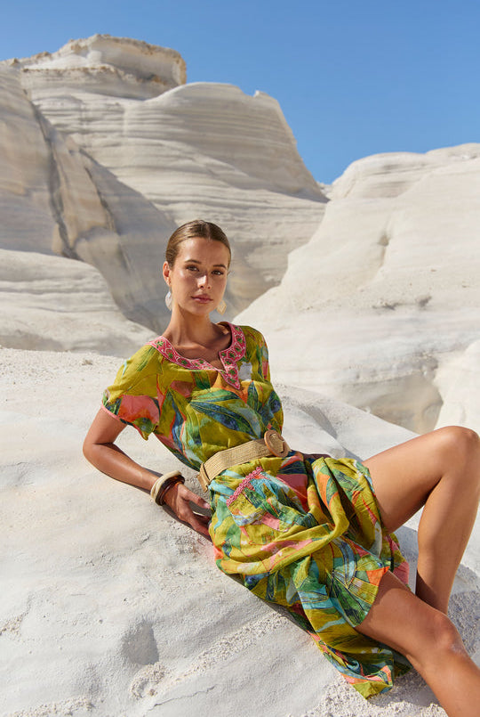 womens green multi leaf print midi dress worn by model outdoor campaign