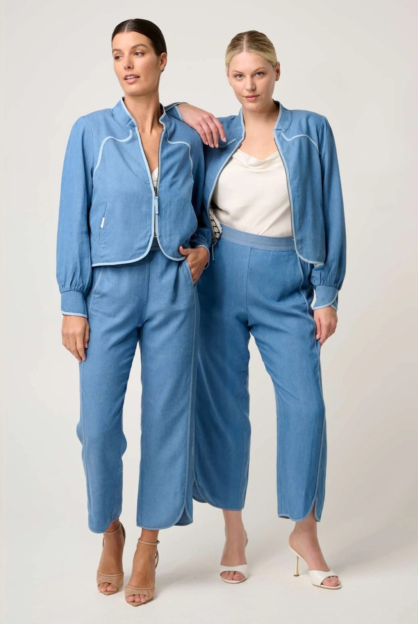 womens blue reversible jacket and pant worn by two model
