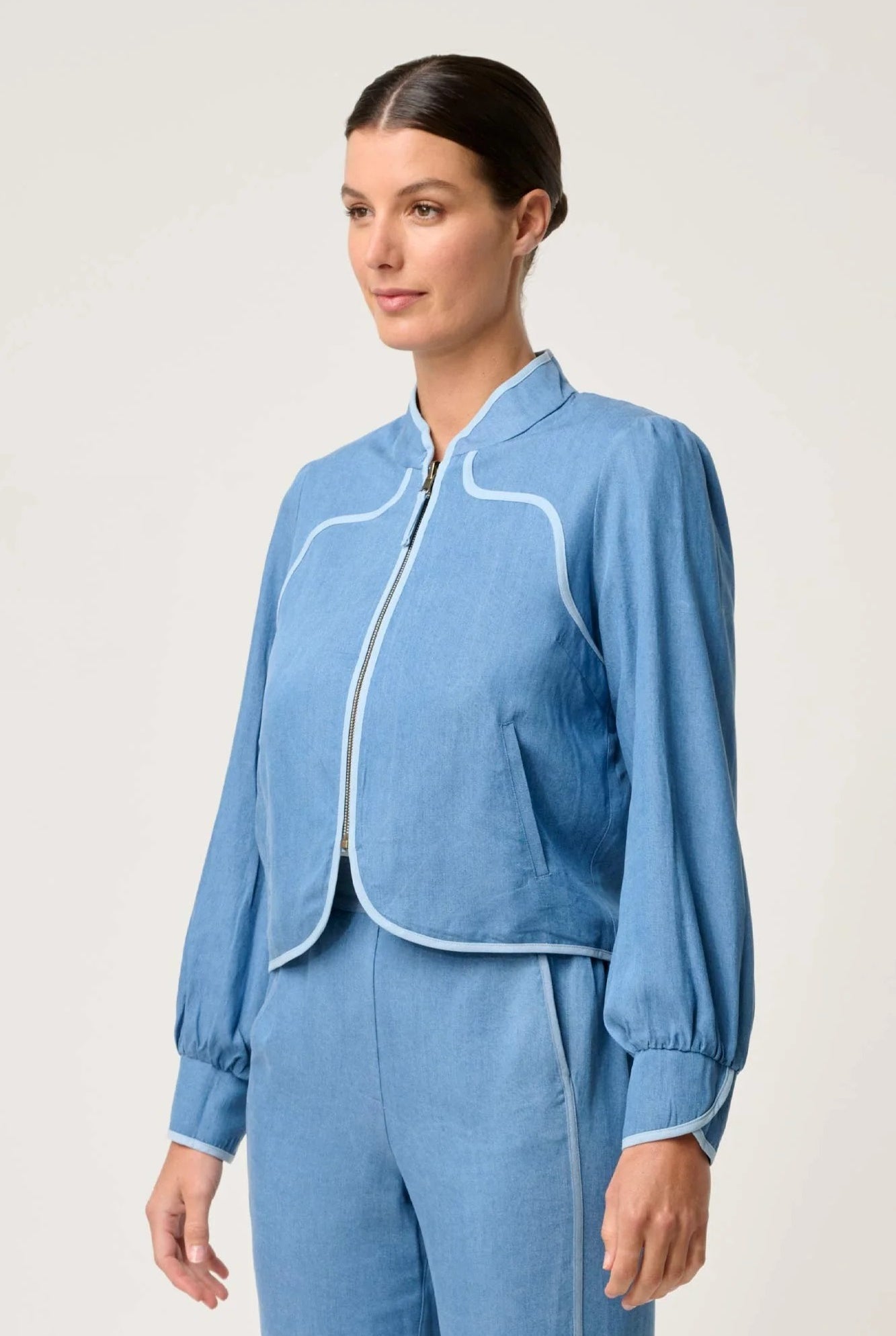 womens blue reversible jacket worn by model