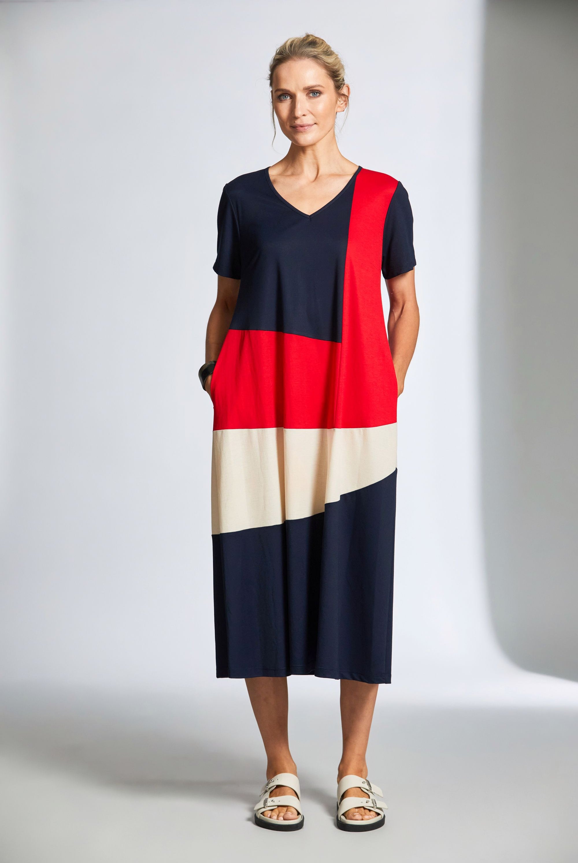 midi dress with navy red and cream colourblocking worn by model