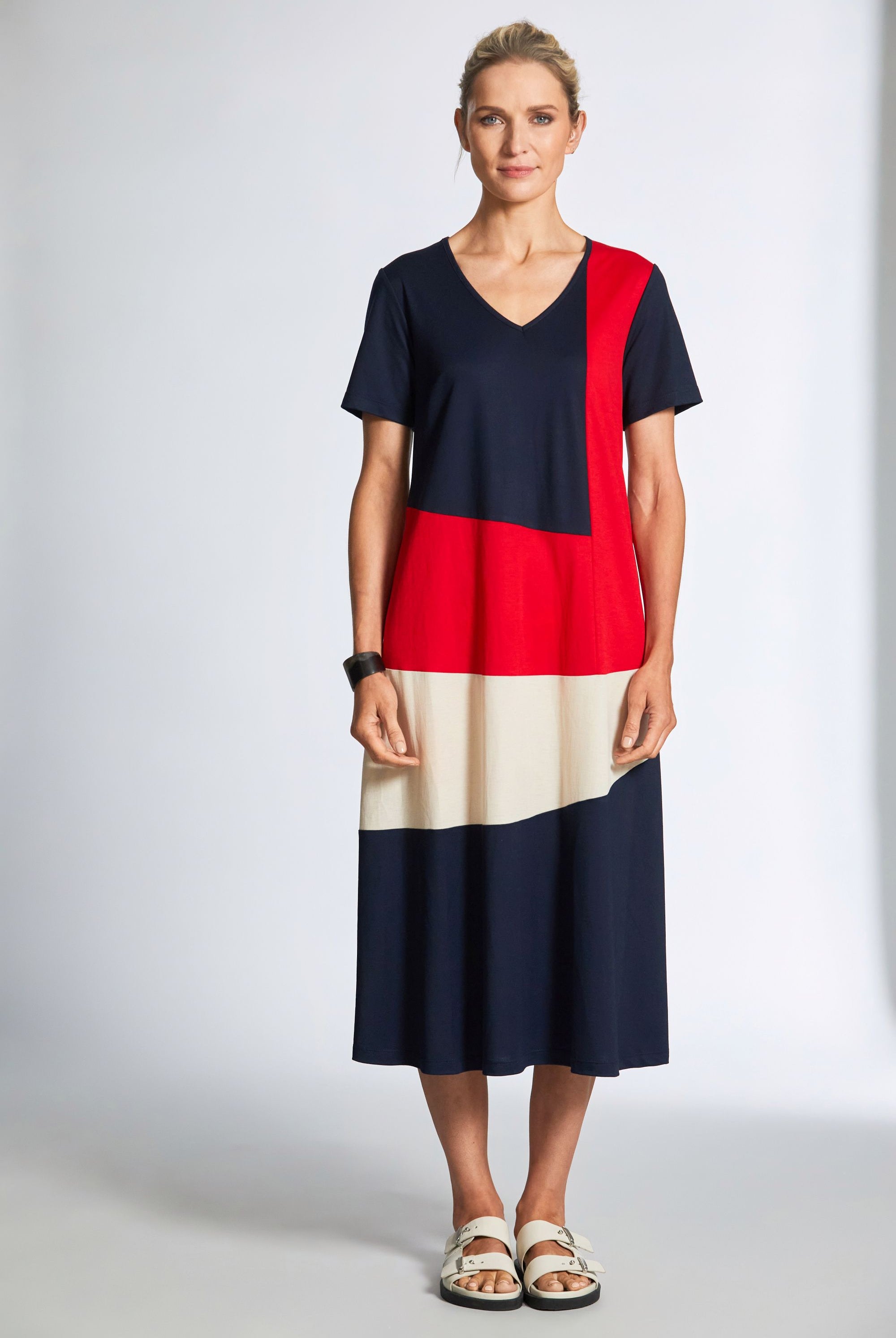 midi dress with navy red and cream colourblocking worn by model